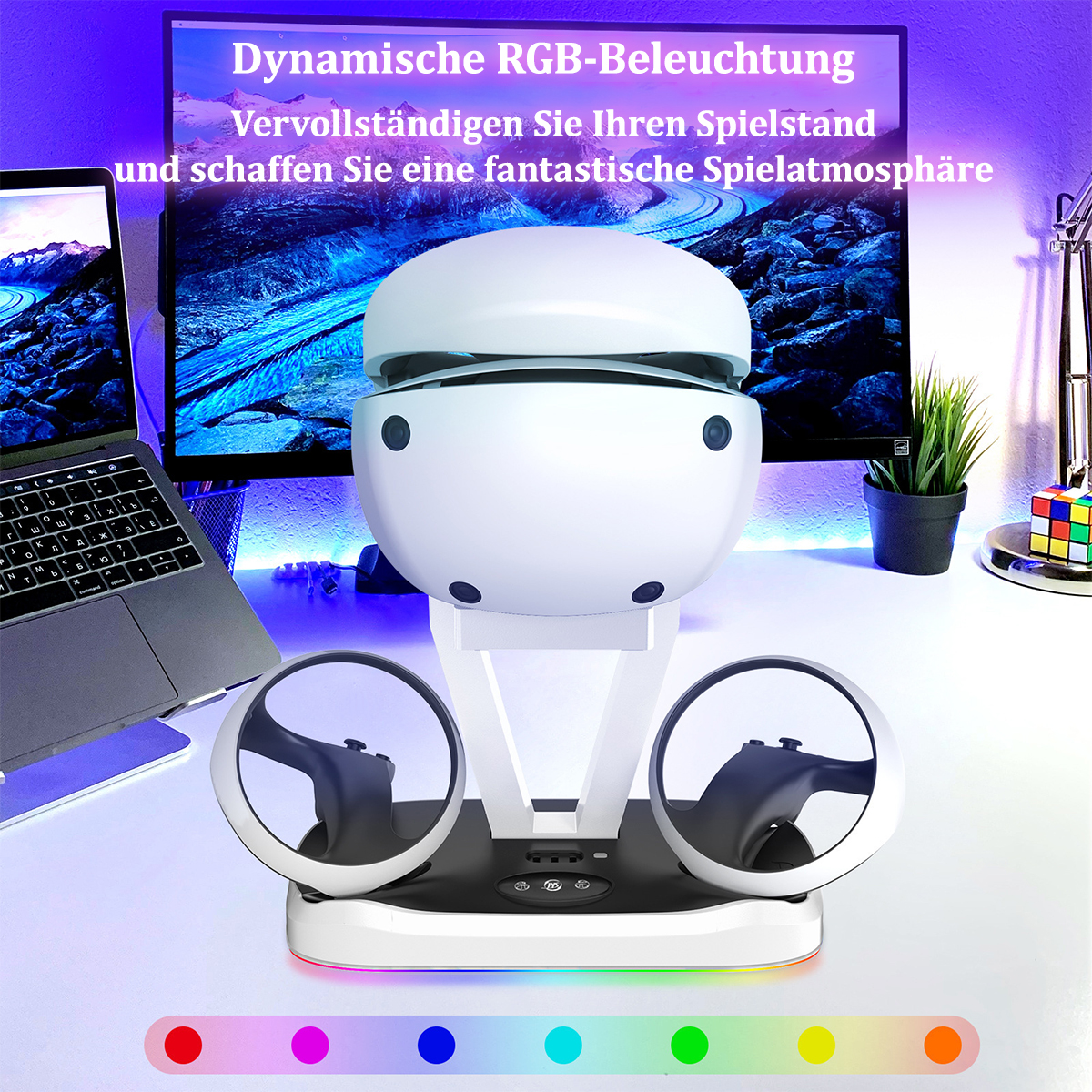 Gaming-Gerät mit bunten Lichtern und einem Laptop auf einem Schreibtisch.