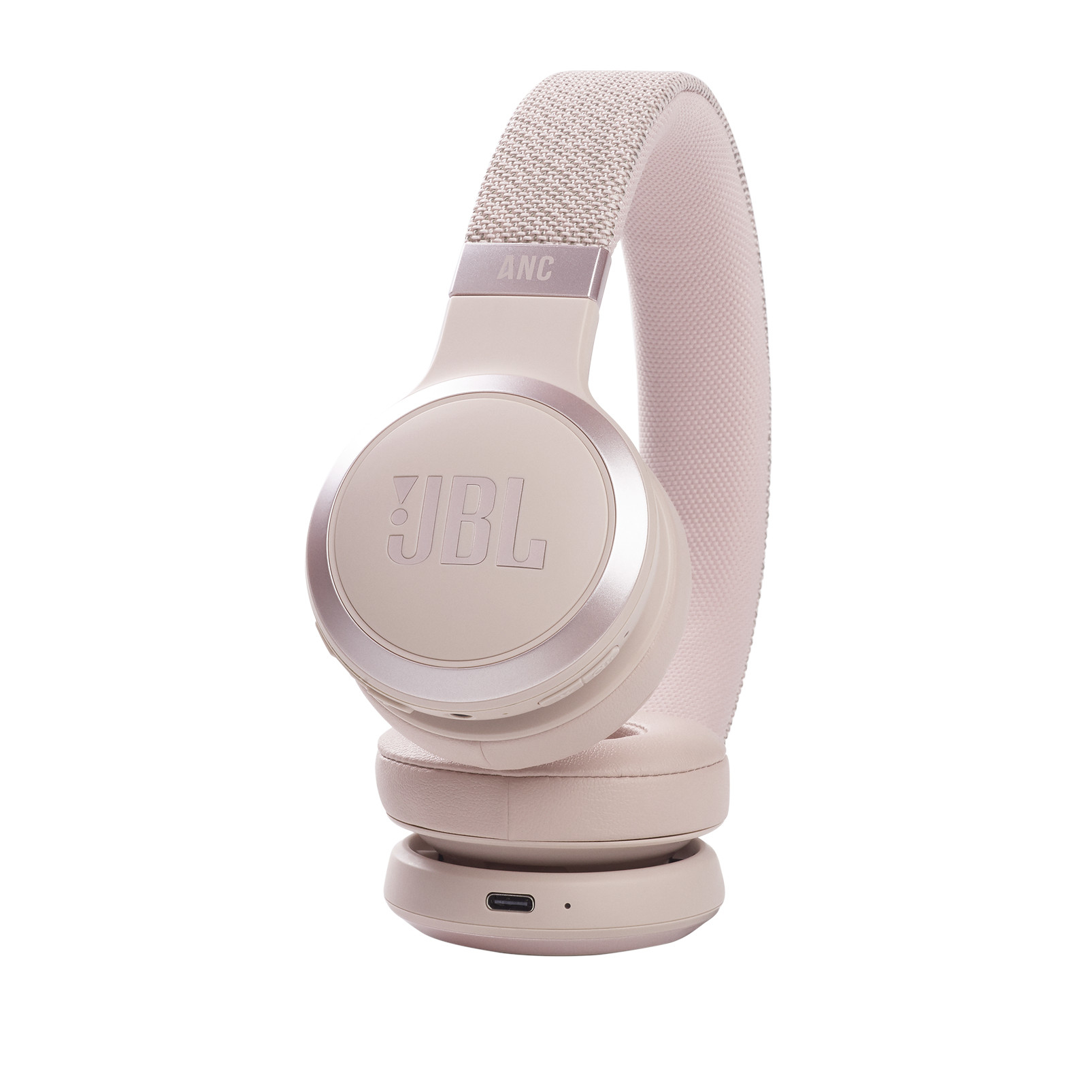 Auriculares JBL beige con detalles plateados, fondo blanco.