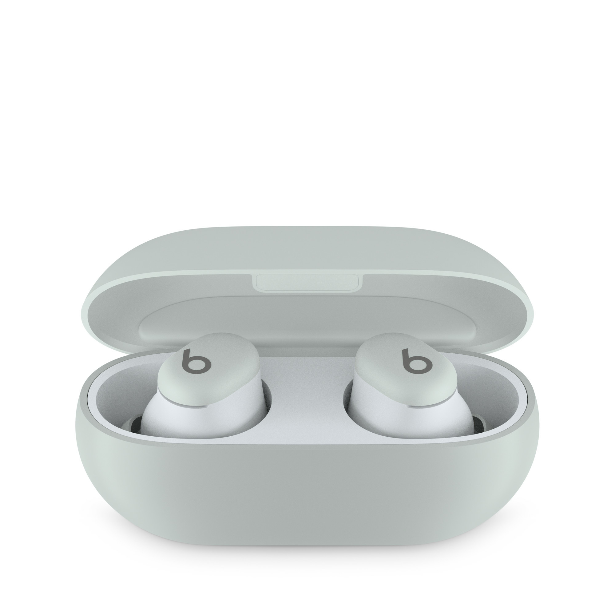 Para miętowych słuchawek Beats w pasującym etui. Etui jest otwarte, widać słuchawki.