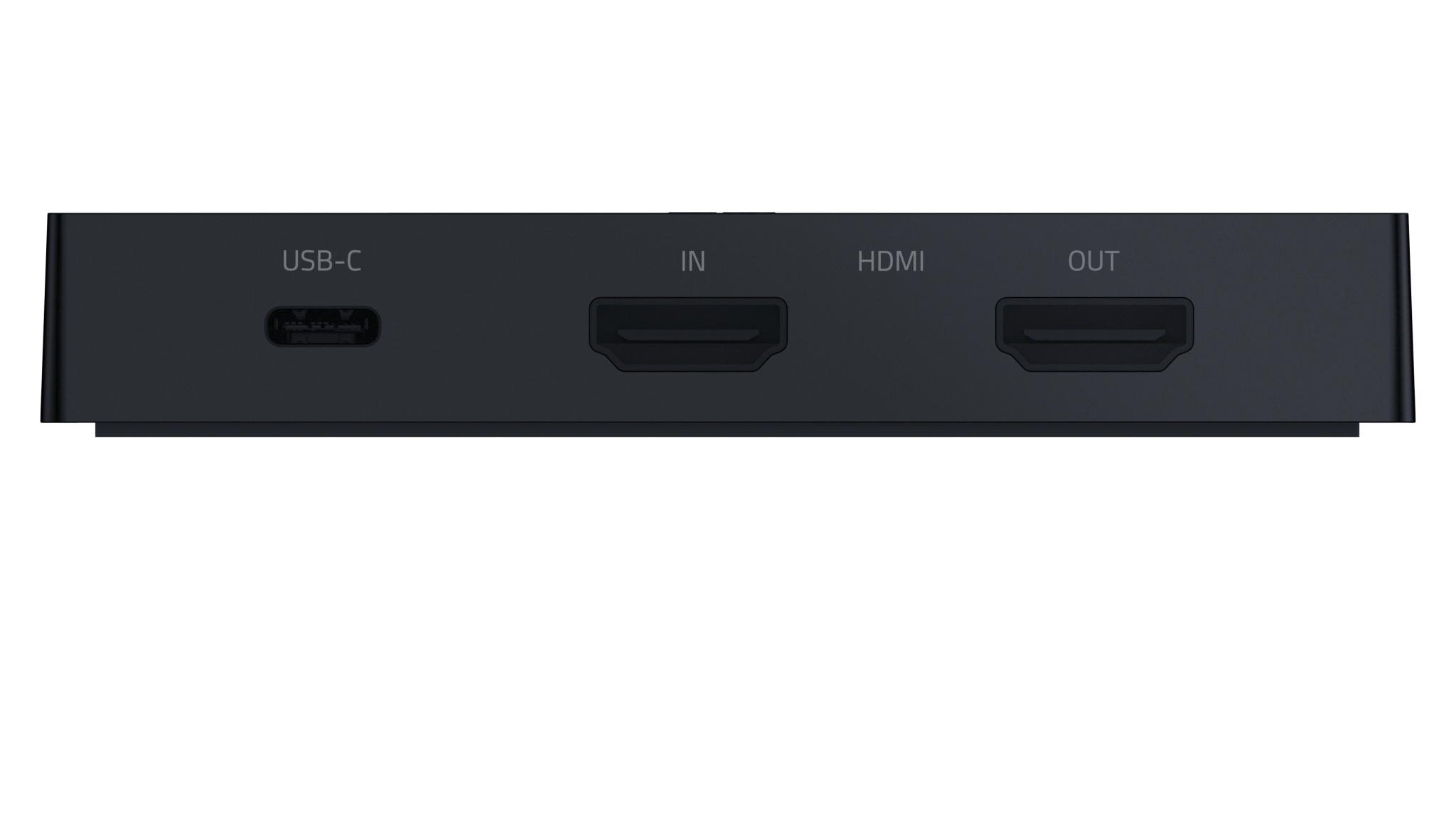 Dispositivo negro con puertos USB-C, IN, HDMI y OUT sobre fondo blanco. Diseño limpio y moderno.