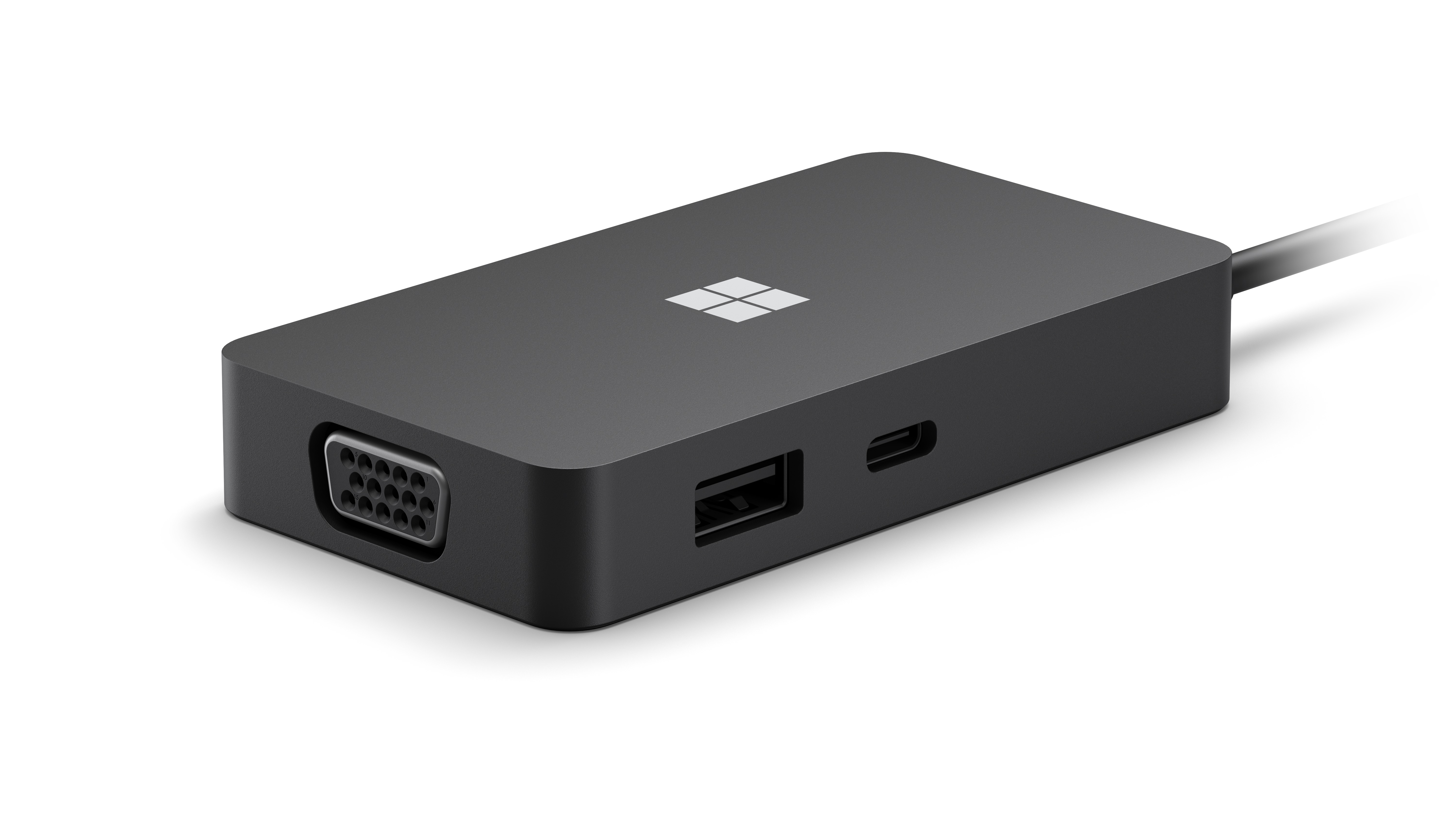 Un hub USB-C nero Microsoft con VGA, USB e altre porte.