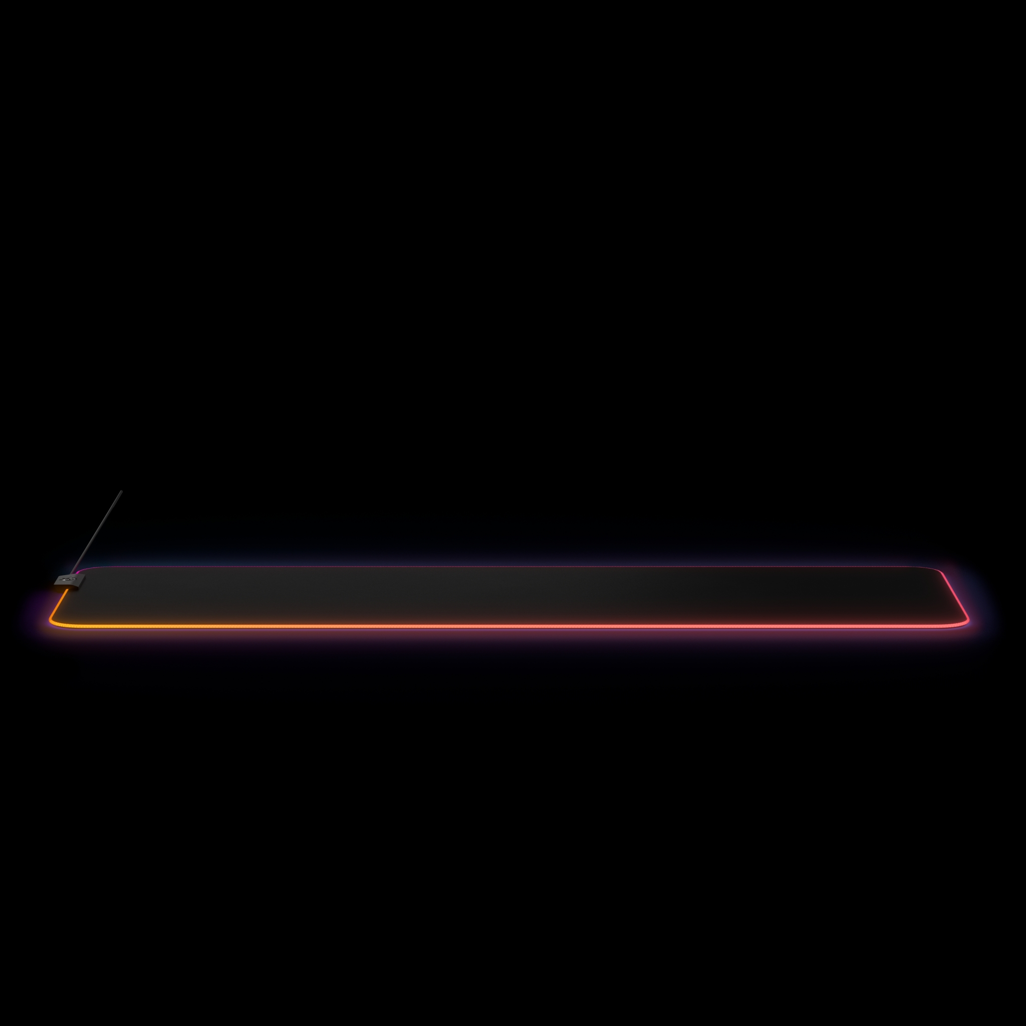 Gaming mousepad with LED lights. Black surface, illuminated edges. Dark background.