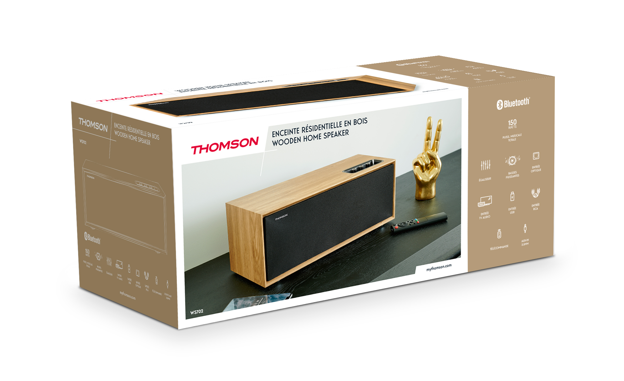 Pudełko głośnika domowego Thomson, z obrazem głośnika, złotą statuetką dłoni i pilotem.