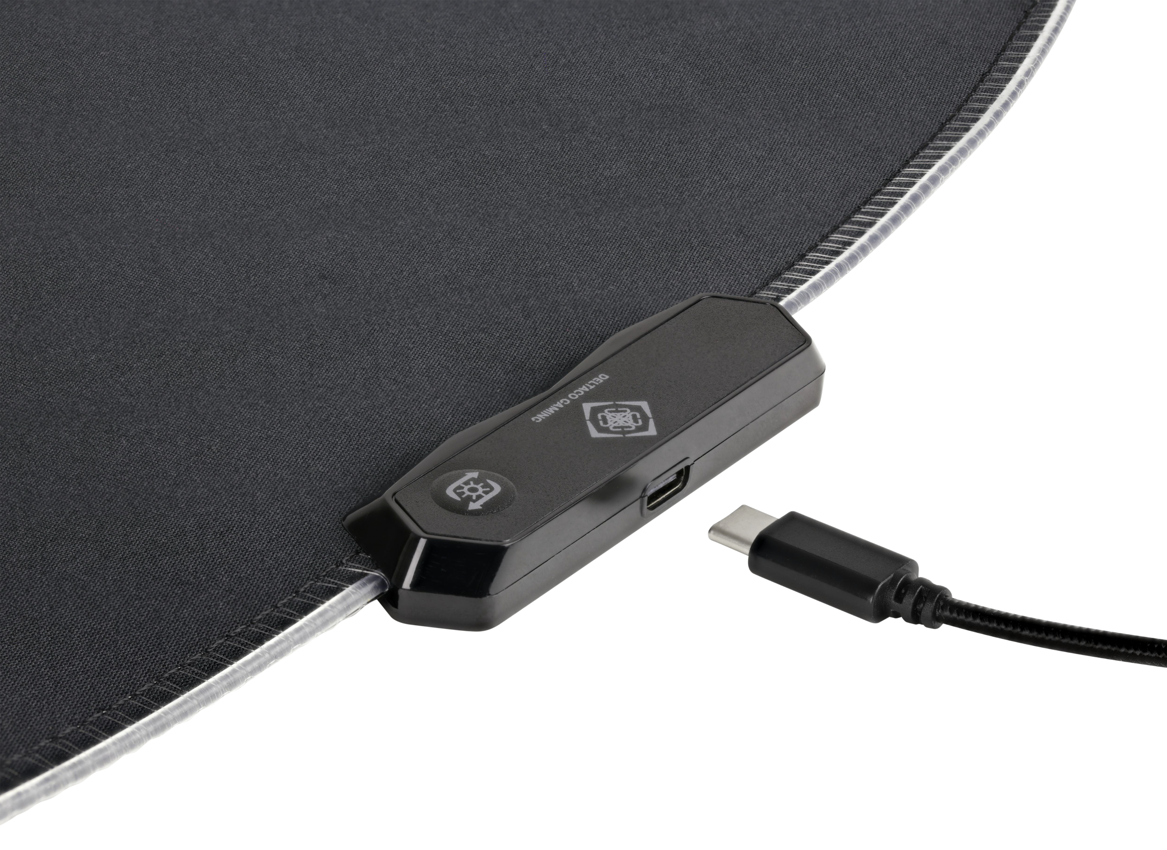 Black gaming mousepad with a control box and USB-C cable.