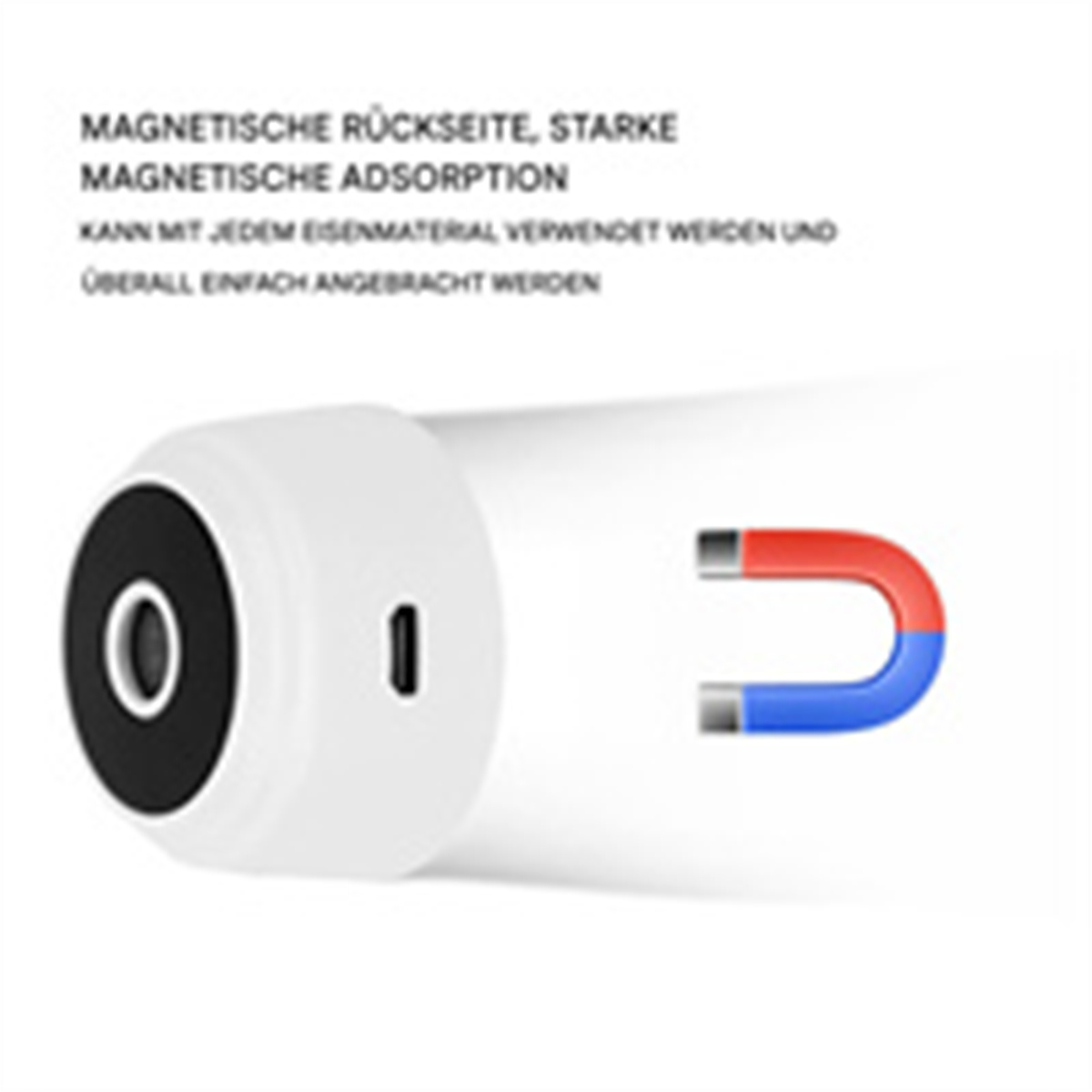 Nahaufnahme eines weißen Geräts mit schwarzem Kreis und Magnet. Weißer Hintergrund.