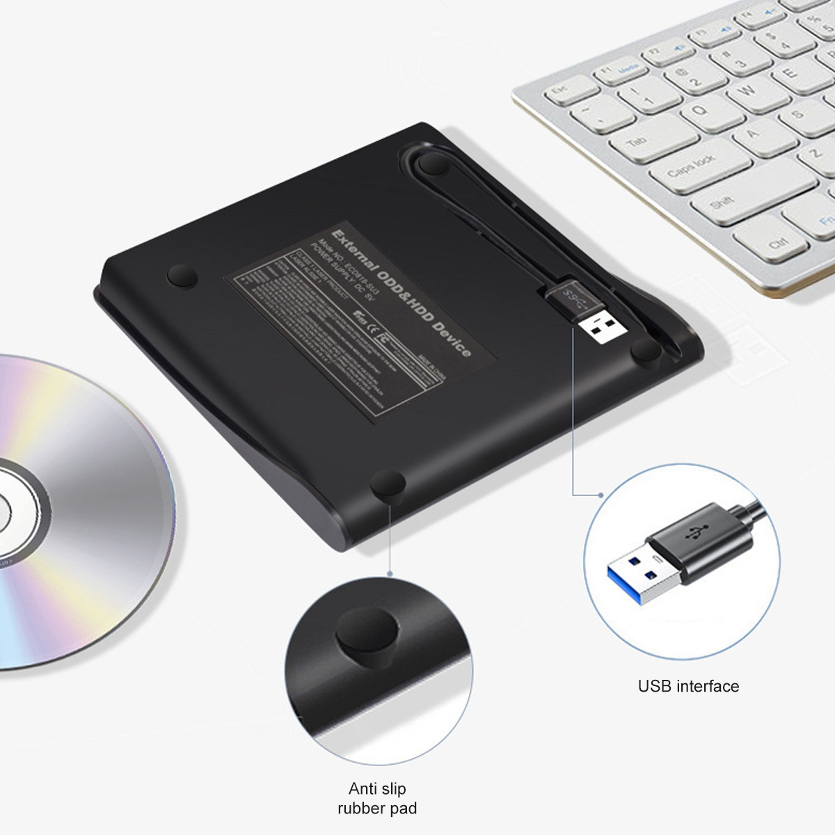 Schwarzes externes ODD/HDD-Gerät. USB-Kabel und Disc. Weißer Hintergrund.