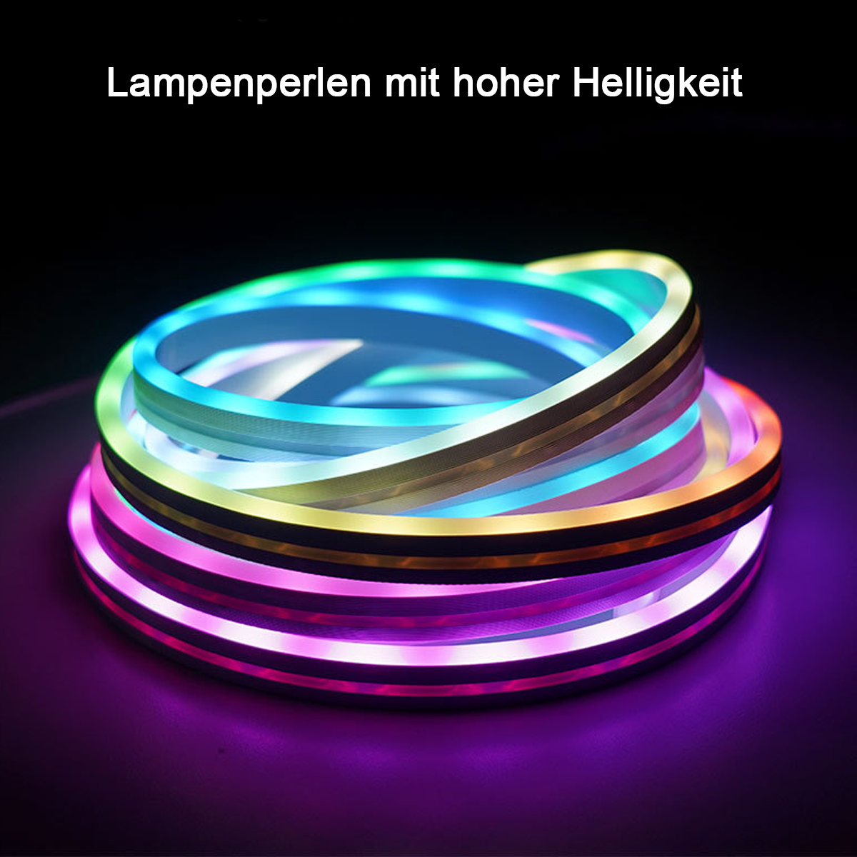 Nahaufnahme von beleuchteten LED-Streifen in verschiedenen Farben, mit schwarzem Hintergrund. Die Streifen sind kreisförmig angeordnet.