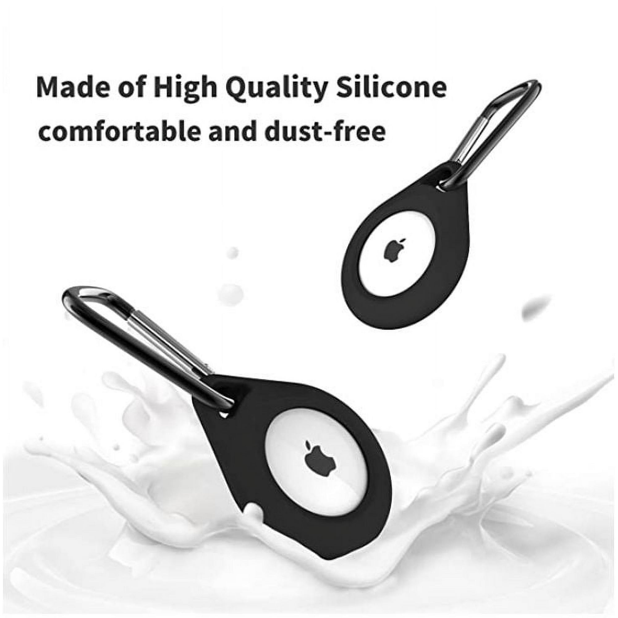 Zwei schwarze AirTag-Halter mit silbernen Clips. Sie sind über einem Flüssigkeitsspritzer, möglicherweise Milch, auf weißem Hintergrund.