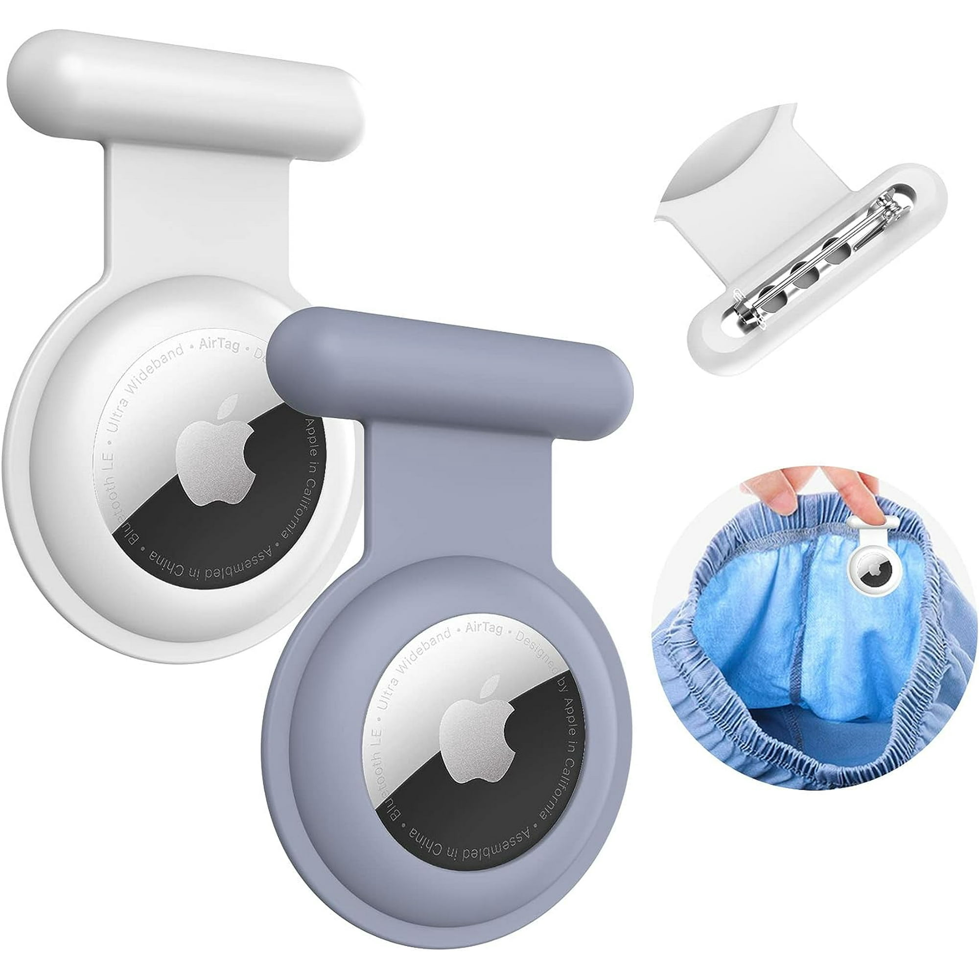 Zwei Apple AirTags, einer weiß, einer grau, mit einem Karabiner und einer Diagramm in Hosen.