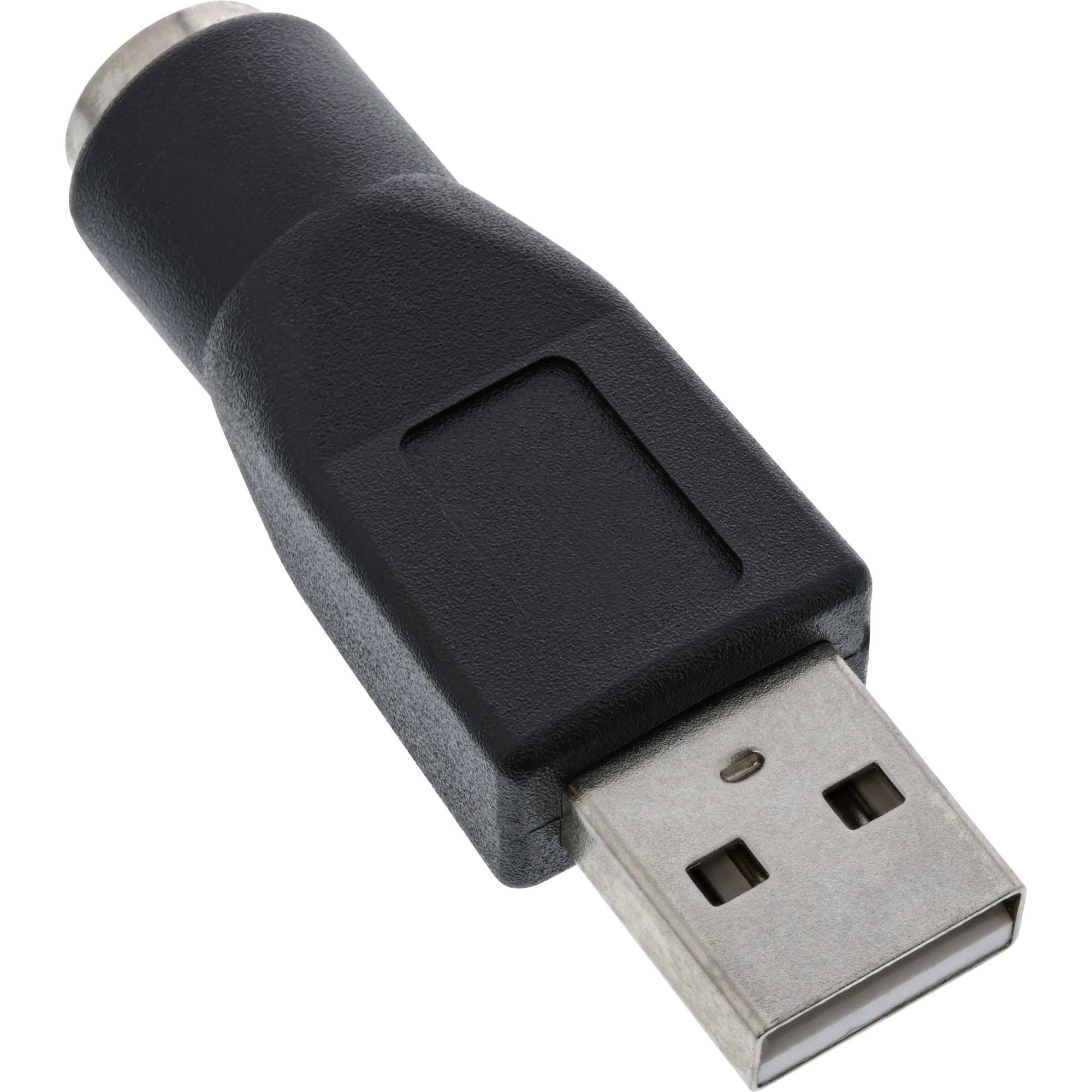 Ein schwarzer USB-zu-PS/2-Adapter.