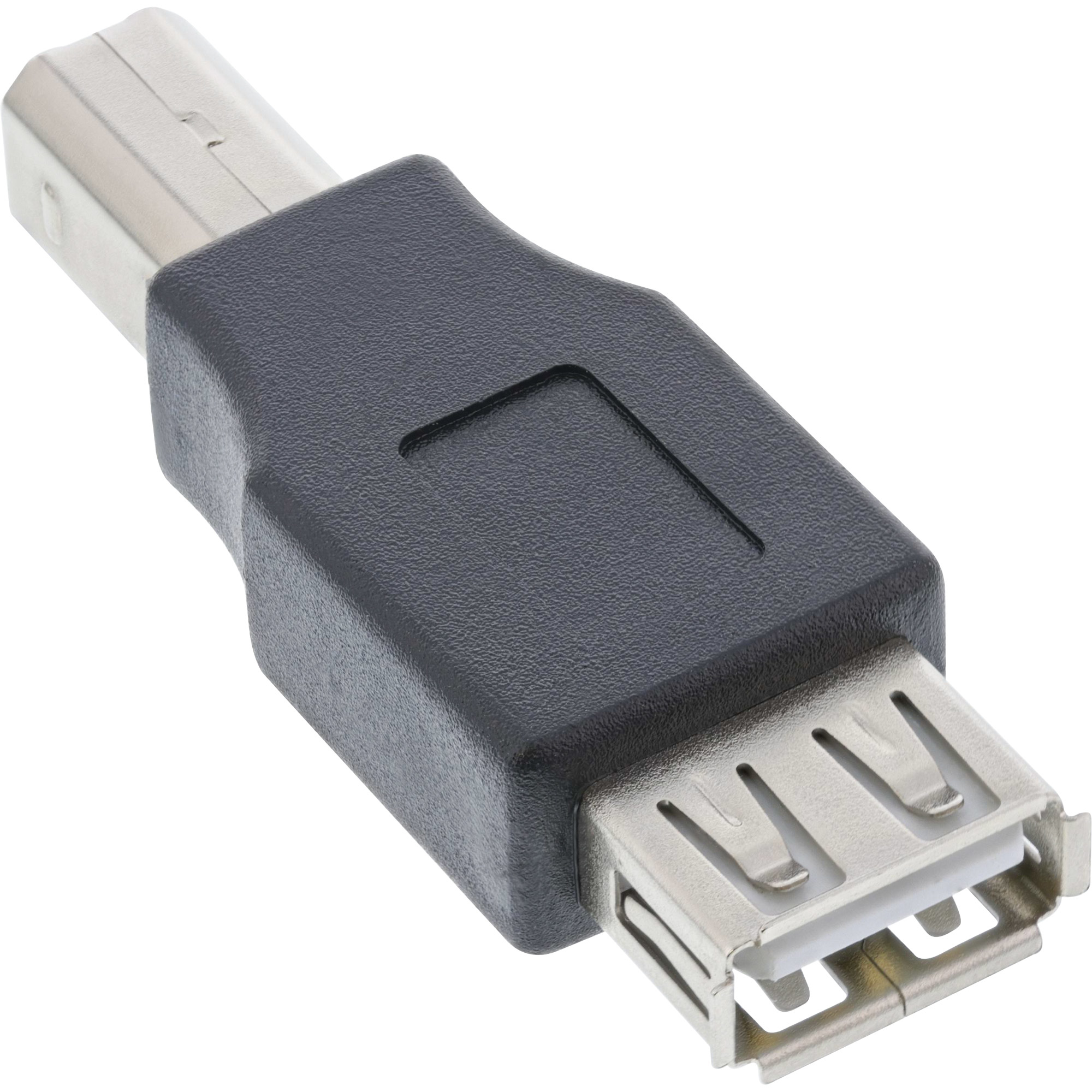 Ein schwarzer USB-Adapter. Hat eine rechteckige schwarze Mitte und zwei Metallenden.