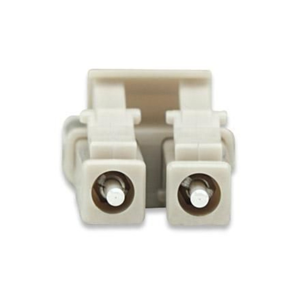 Connettore in fibra ottica beige. Due porte, punti bianchi. Isolato su sfondo bianco.