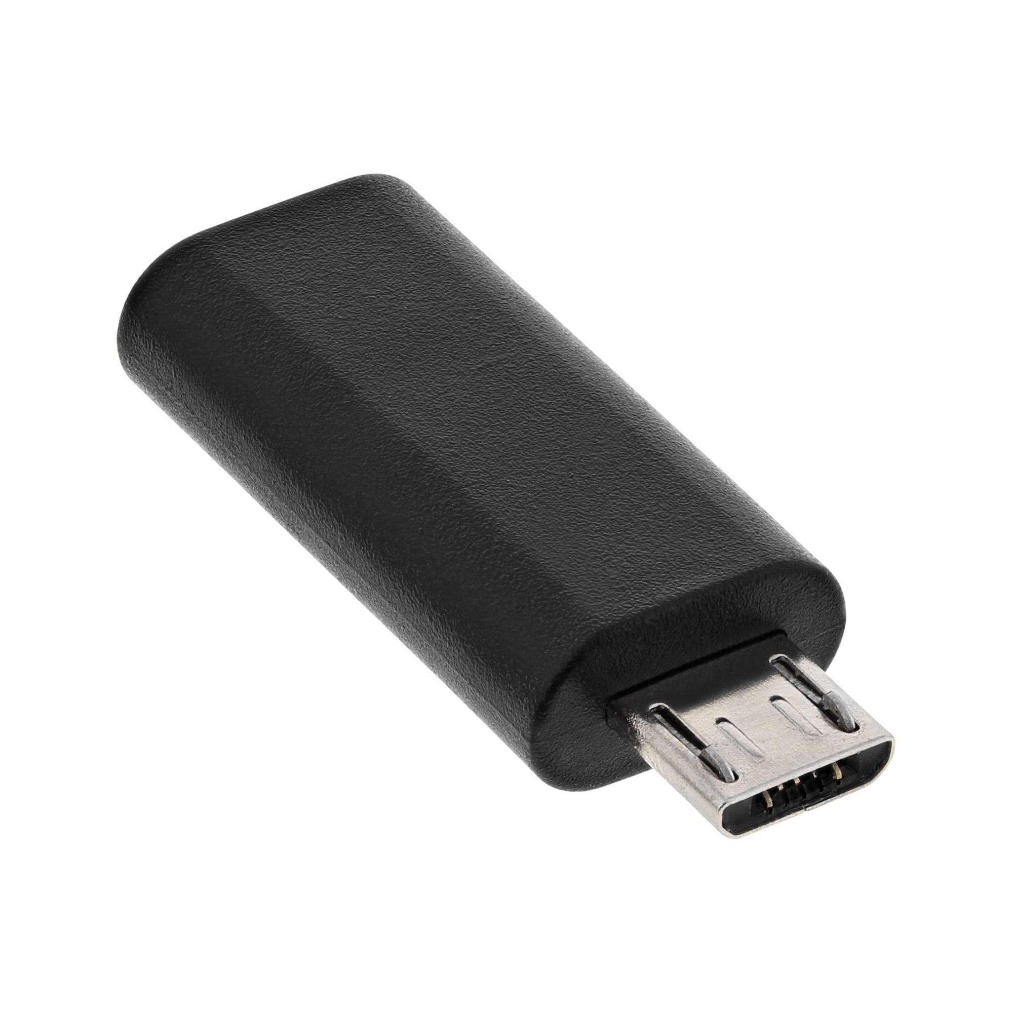 Ein schwarzer Micro-USB-Adapter mit einem USB-Stecker. Kompaktes, einfaches Design.