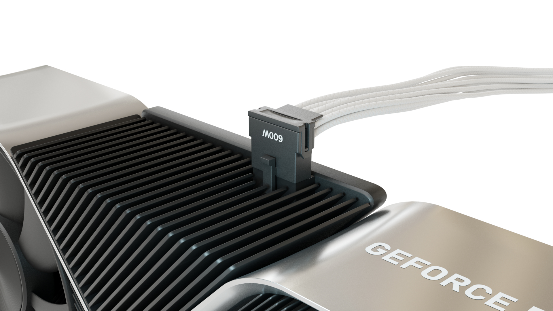 Nahaufnahme einer GPU mit schwarzem Kühlkörper und weißen Stromkabeln.