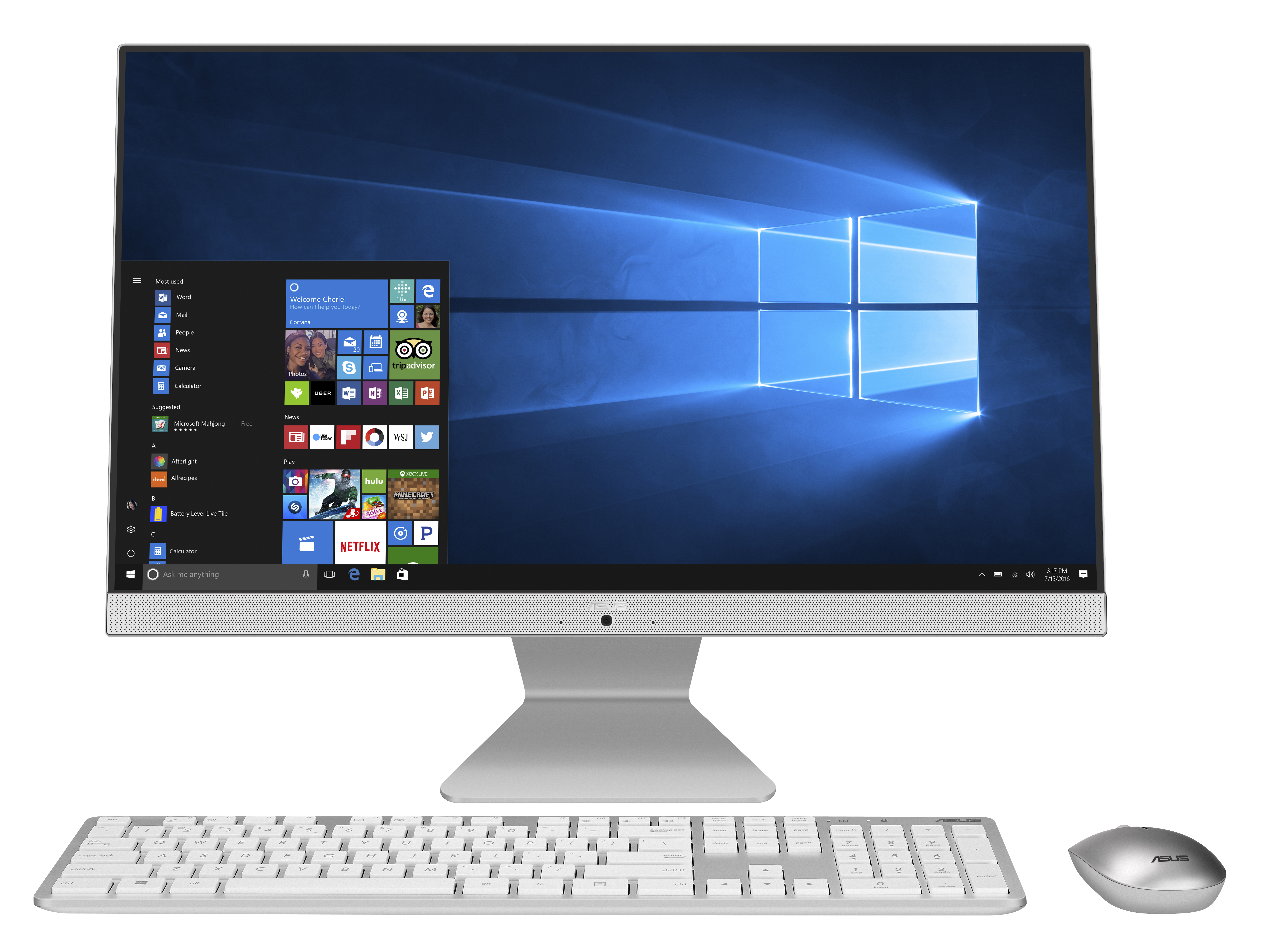 Monitor de computadora plateado con teclado y ratón sobre fondo blanco.