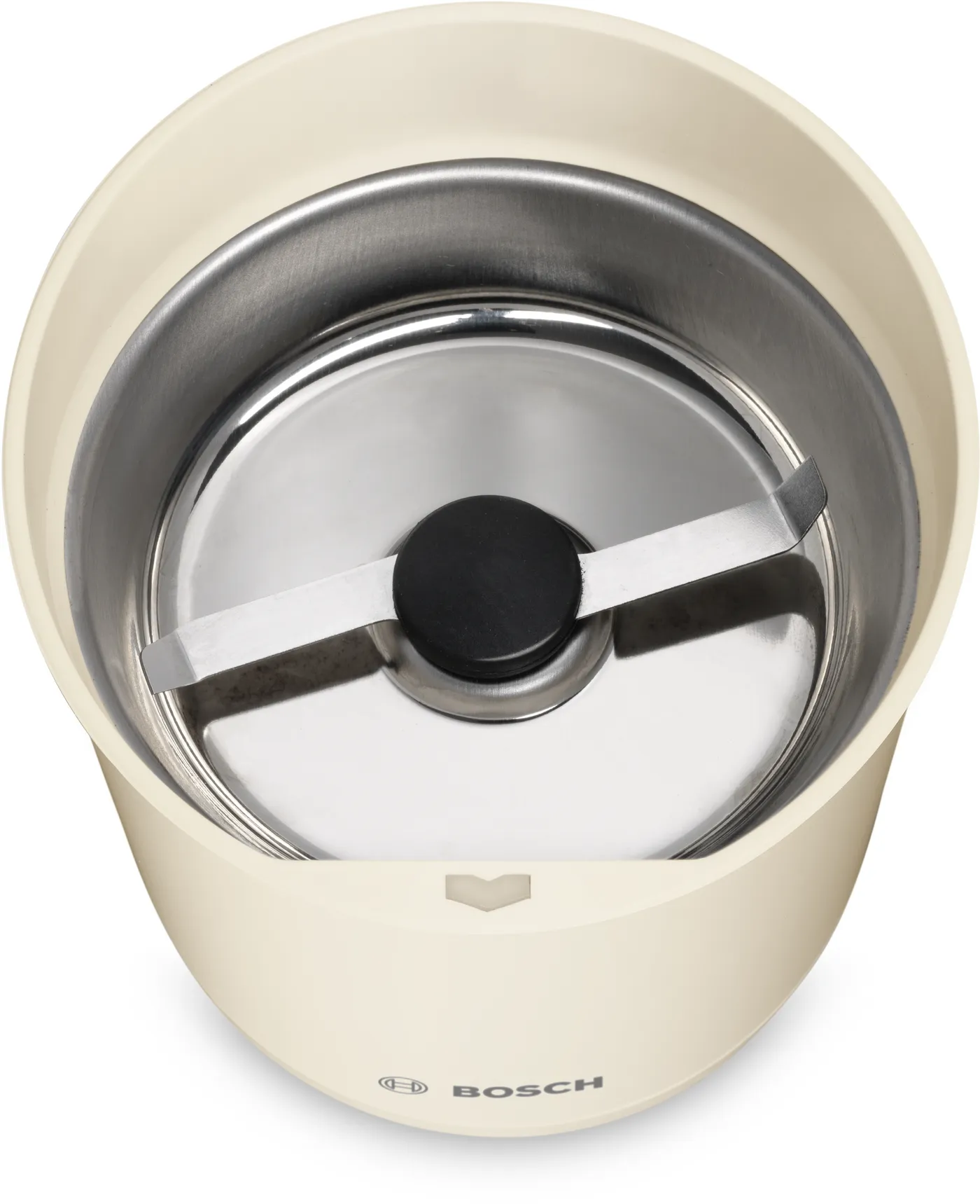 Kremowy młynek do kawy z ostrzem w środku, czarne koło pośrodku.