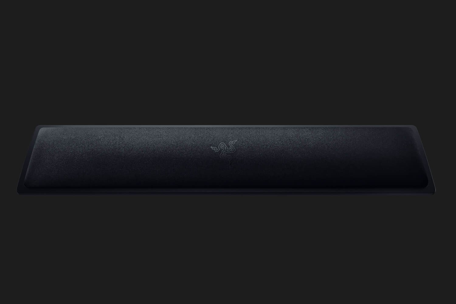 Un repose-poignet Razer noir avec le logo Razer centré sur un fond sombre.