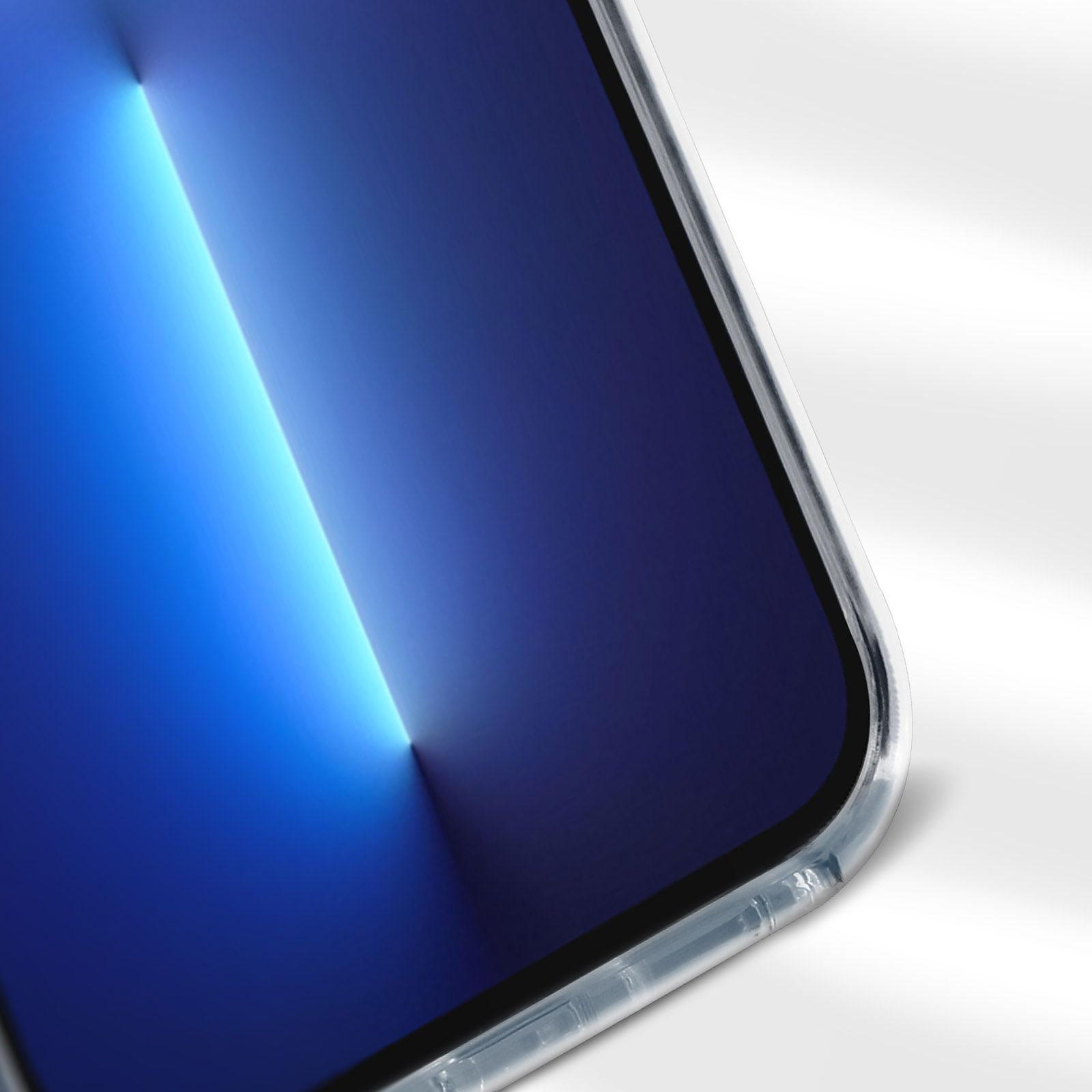 Un angolo dello schermo di un telefono con uno sfondo sfumato blu e bianco.