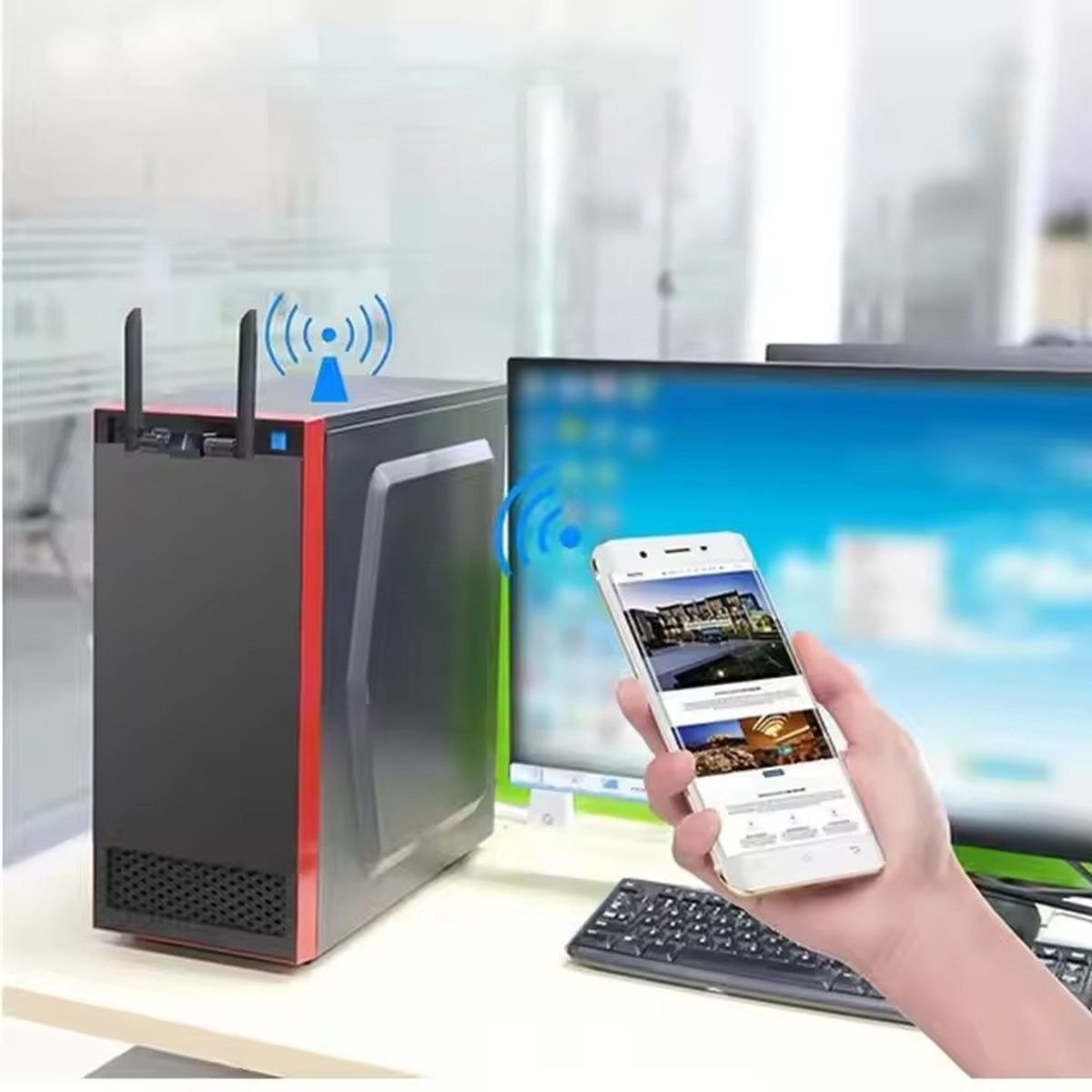 Komputer z czarną i czerwoną obudową, z osobą trzymającą telefon z widokiem domu.