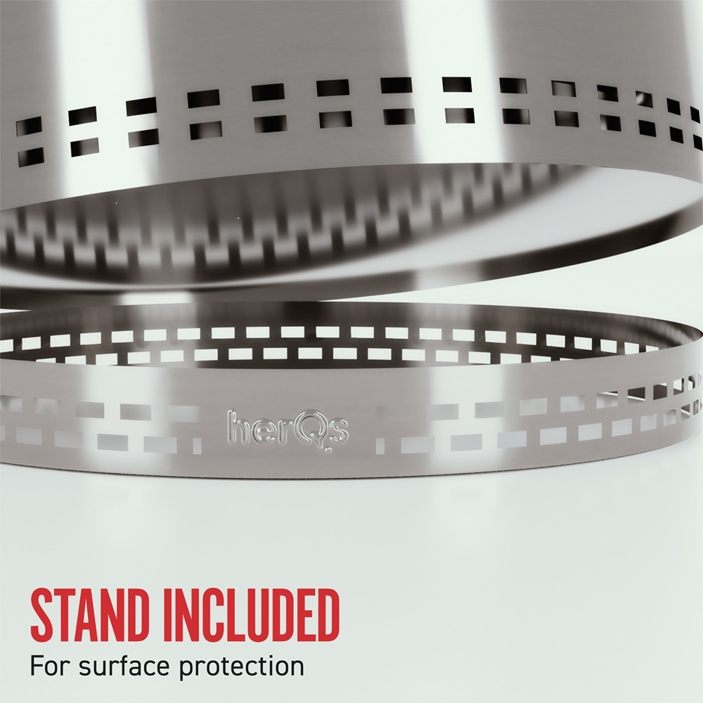 Close-up van een zilveren vuurkorf met standaard. Tekst luidt 'STAND INCLUDED' en 'For surface protection'.