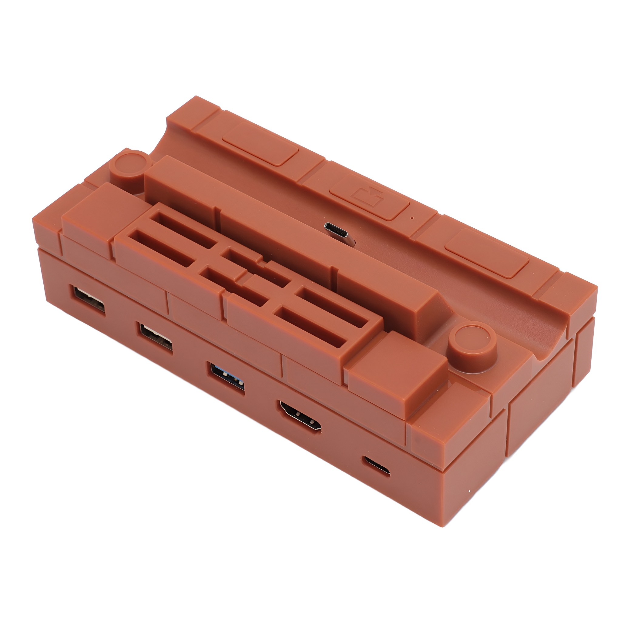Braunes, ziegelähnliches Gerät mit mehreren USB-, HDMI- und anderen Anschlüssen. Winkelansicht.