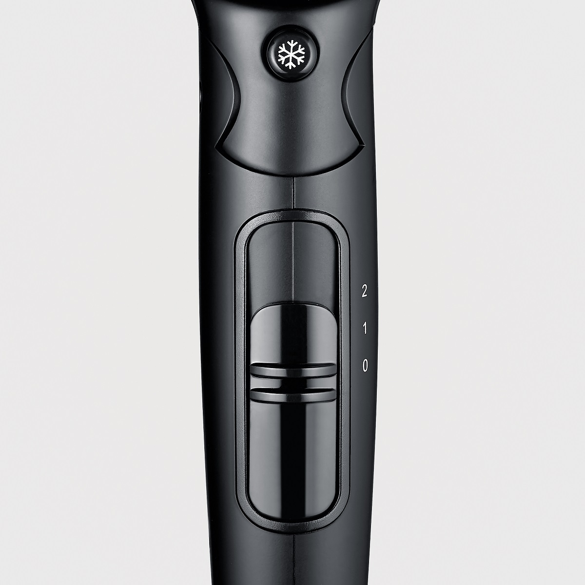 Czarny panel sterowania suszarki, pokazujący ustawienia temperatury.