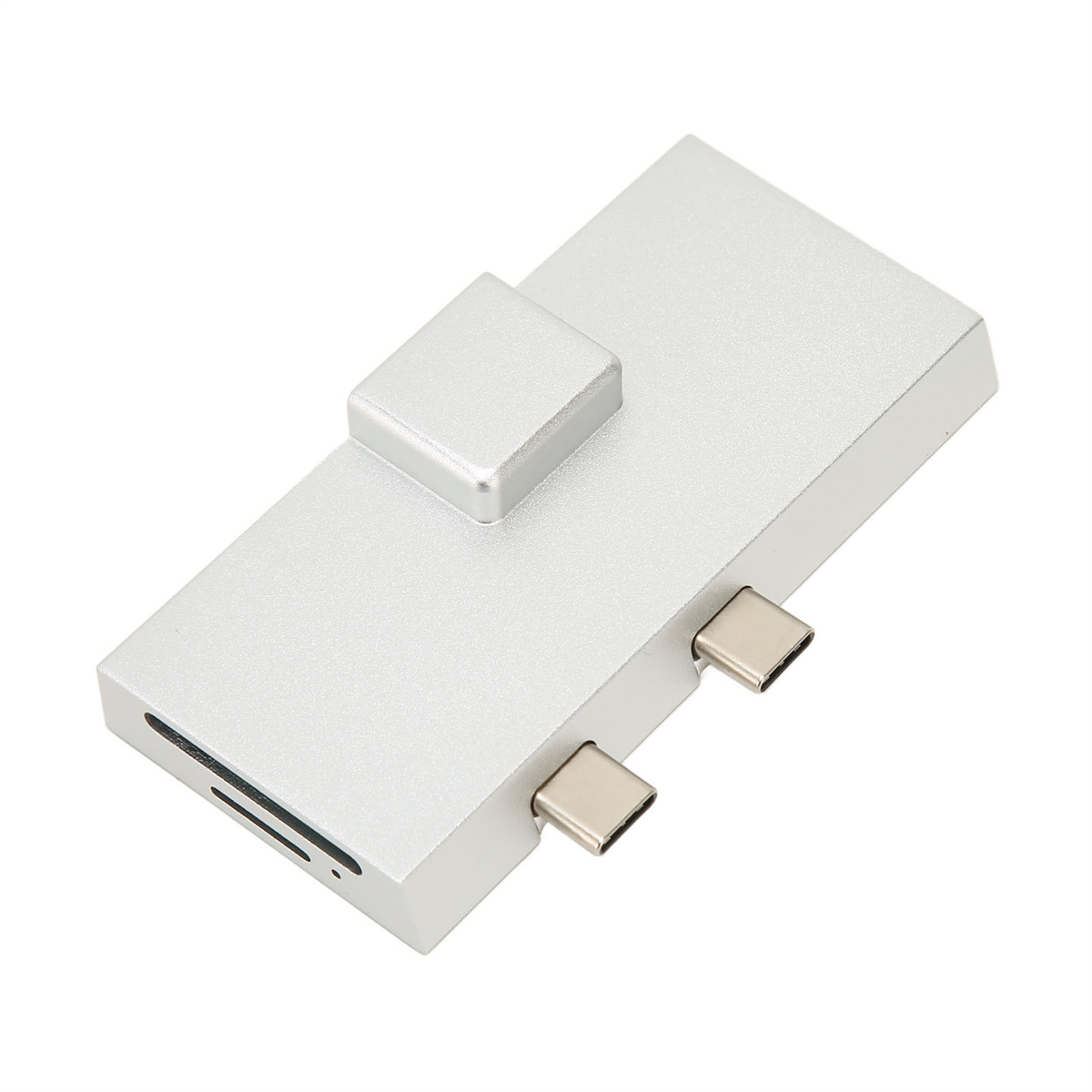 Ein silberner USB-Hub mit zwei USB-C-Anschlüssen und einem SD-Kartensteckplatz.