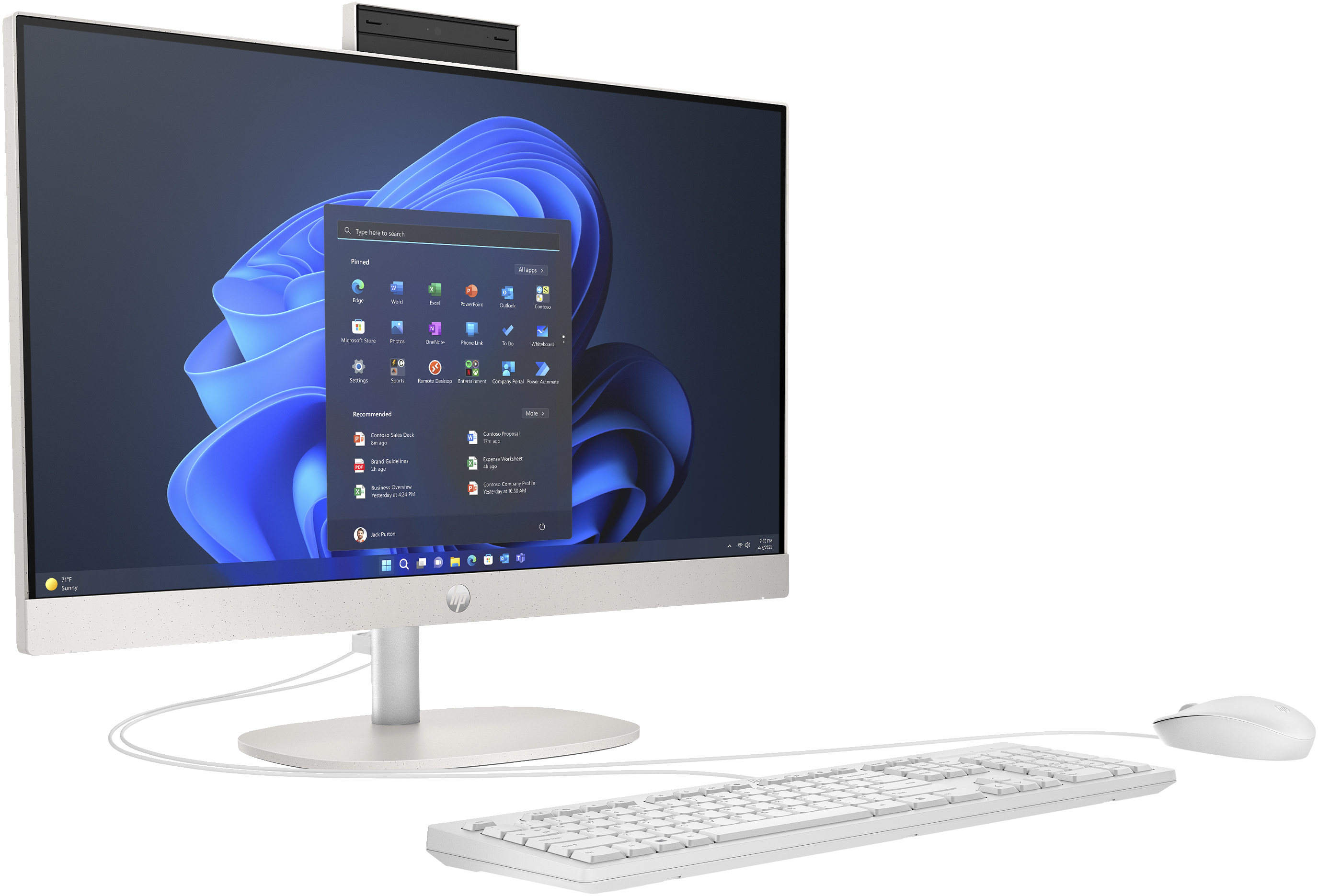 Biały monitor komputera, klawiatura i mysz. Monitor wyświetla interfejs systemu Windows 11.