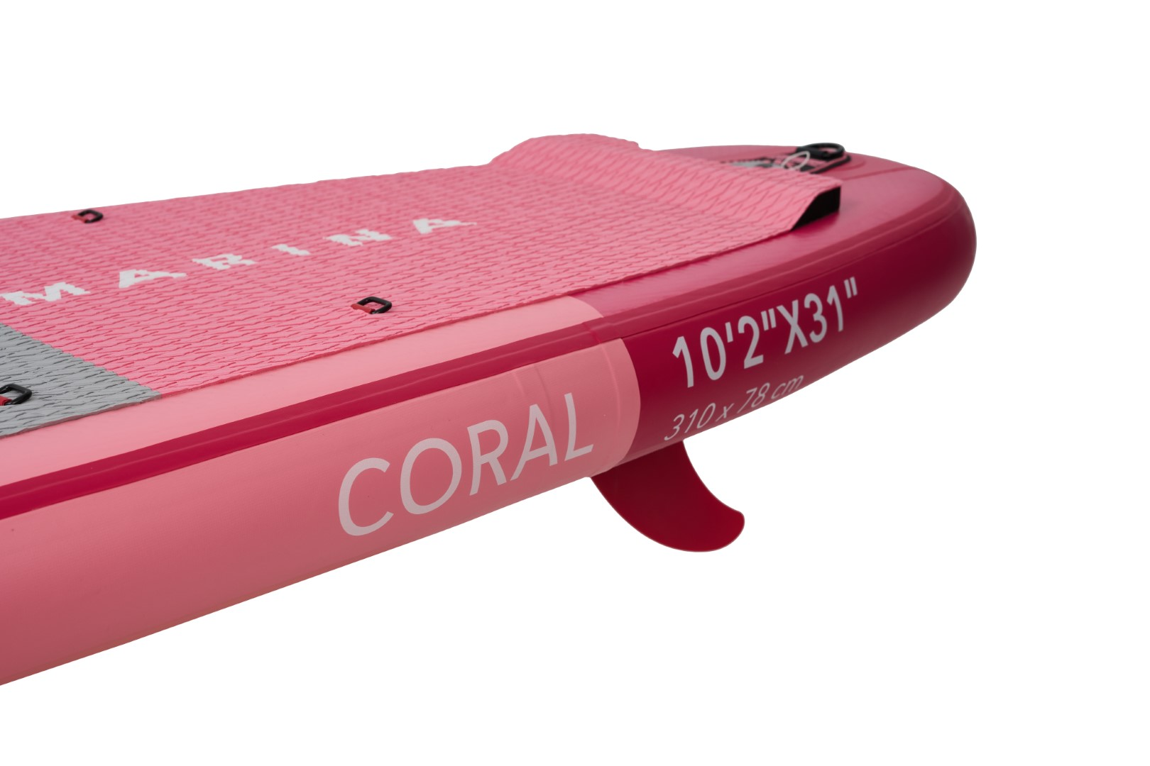 Rosa und weißes Paddle-Board mit dem Wort CORAL darauf und roter Finne.