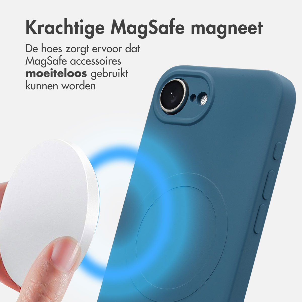 Un étui de téléphone bleu avec un chargeur rond blanc et une main qui le tient.