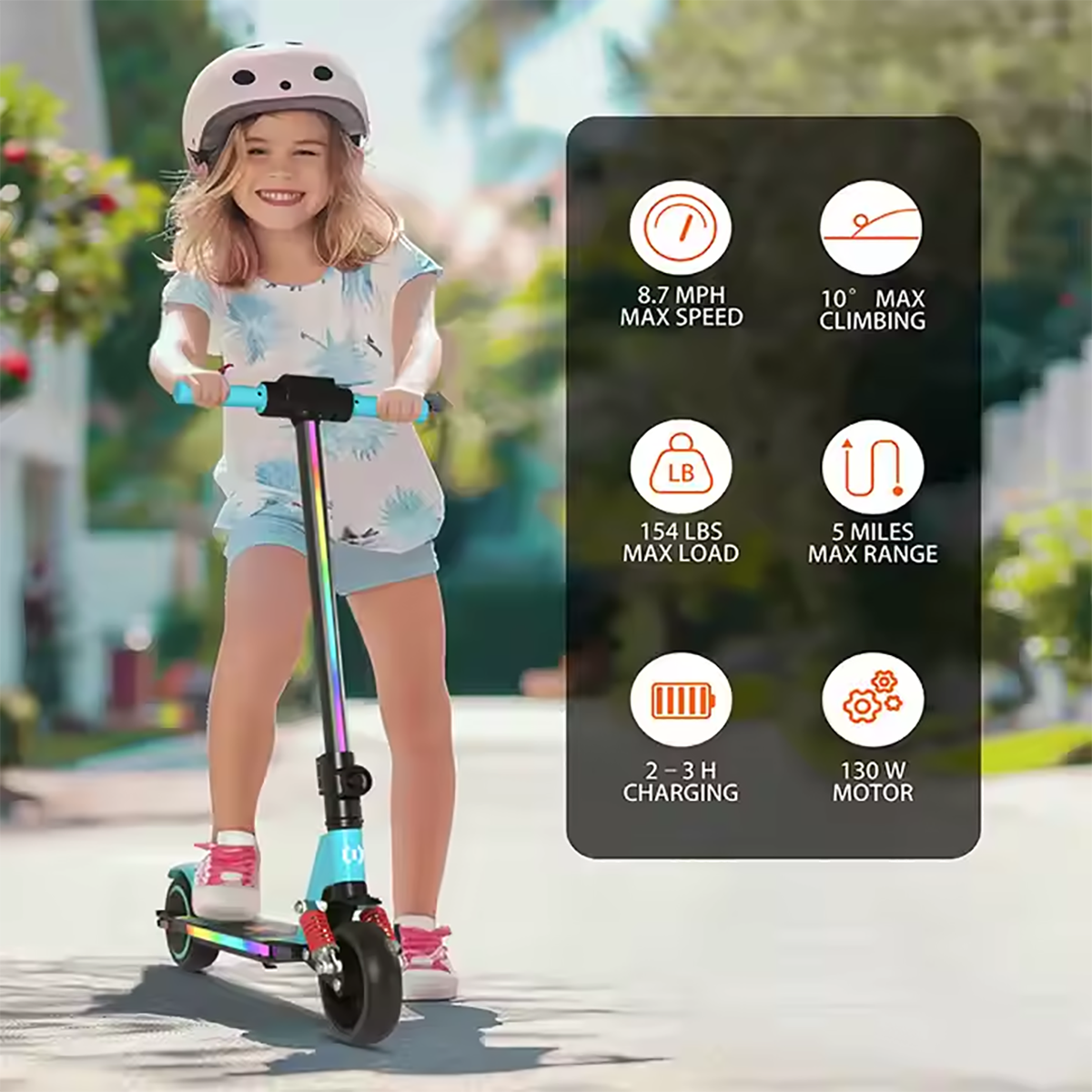 Młoda dziewczyna jadąca na kolorowej hulajnodze. Statystyki: prędkość maks. 14 km/h, wznoszenie maks. 10°, obciążenie 70 kg.