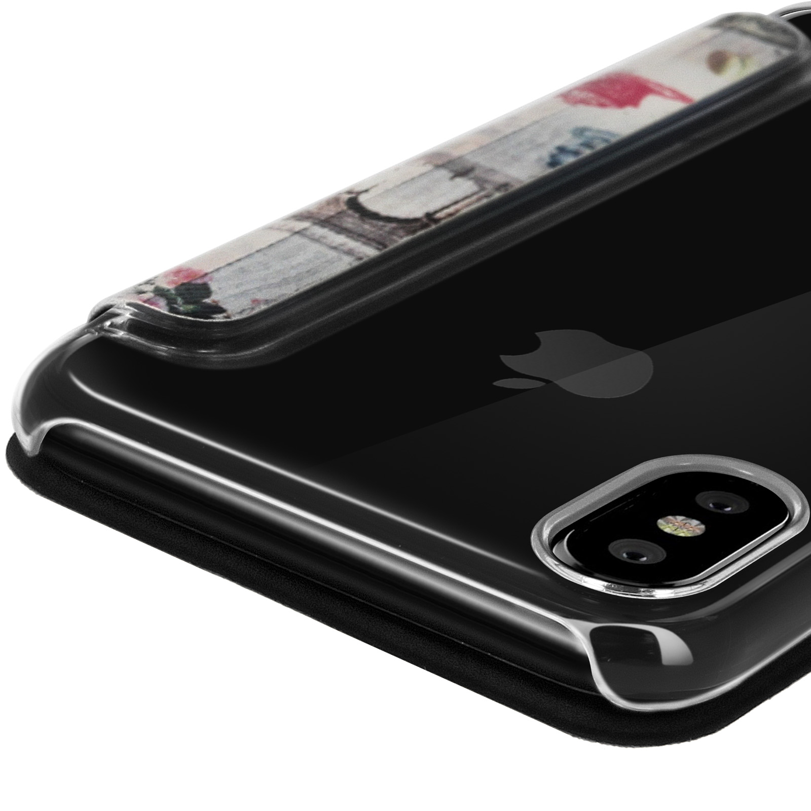 Primo piano di un iPhone X nero in una custodia trasparente con cinturino floreale, la fotocamera è a fuoco.