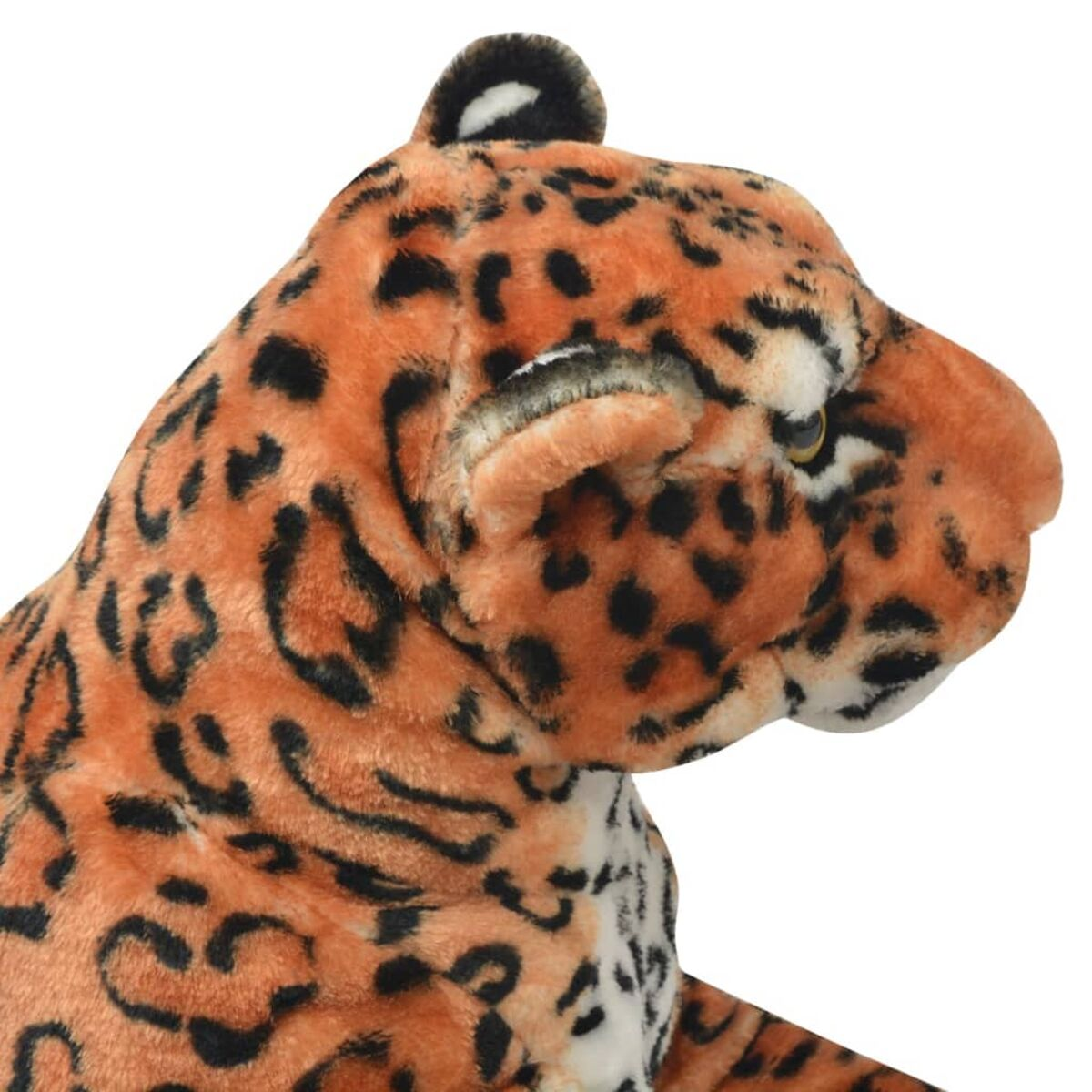 Ein orangefarbener Plüsch-Jaguar mit schwarzen Flecken im Profil.