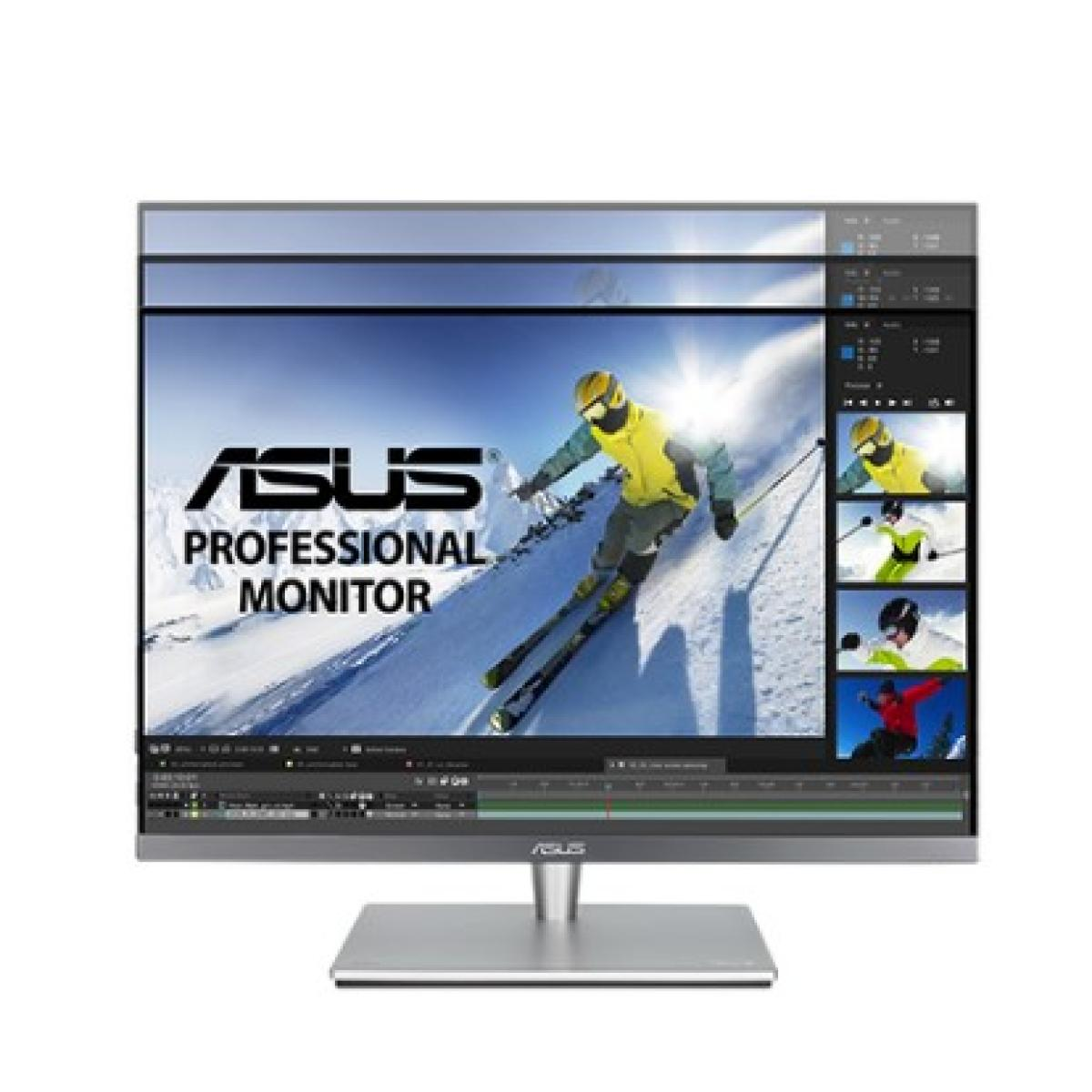 Monitor profesional Asus que muestra a un esquiador en una ladera nevada, software de edición visible.