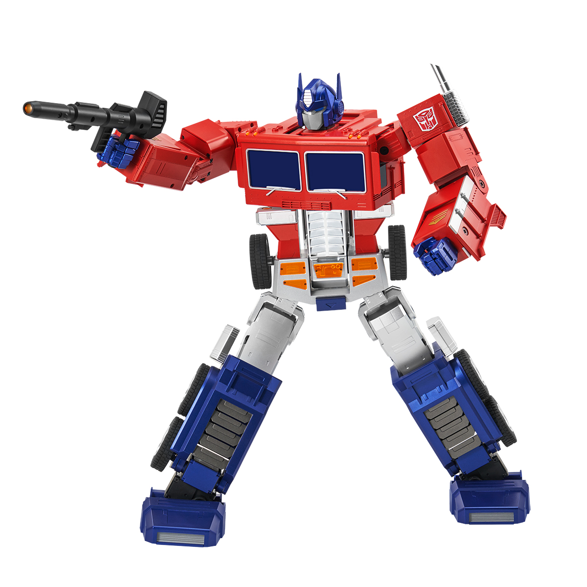 Juguete Optimus Prime en pose de pie. Colores rojo y azul. Sosteniendo un arma. Fondo blanco.