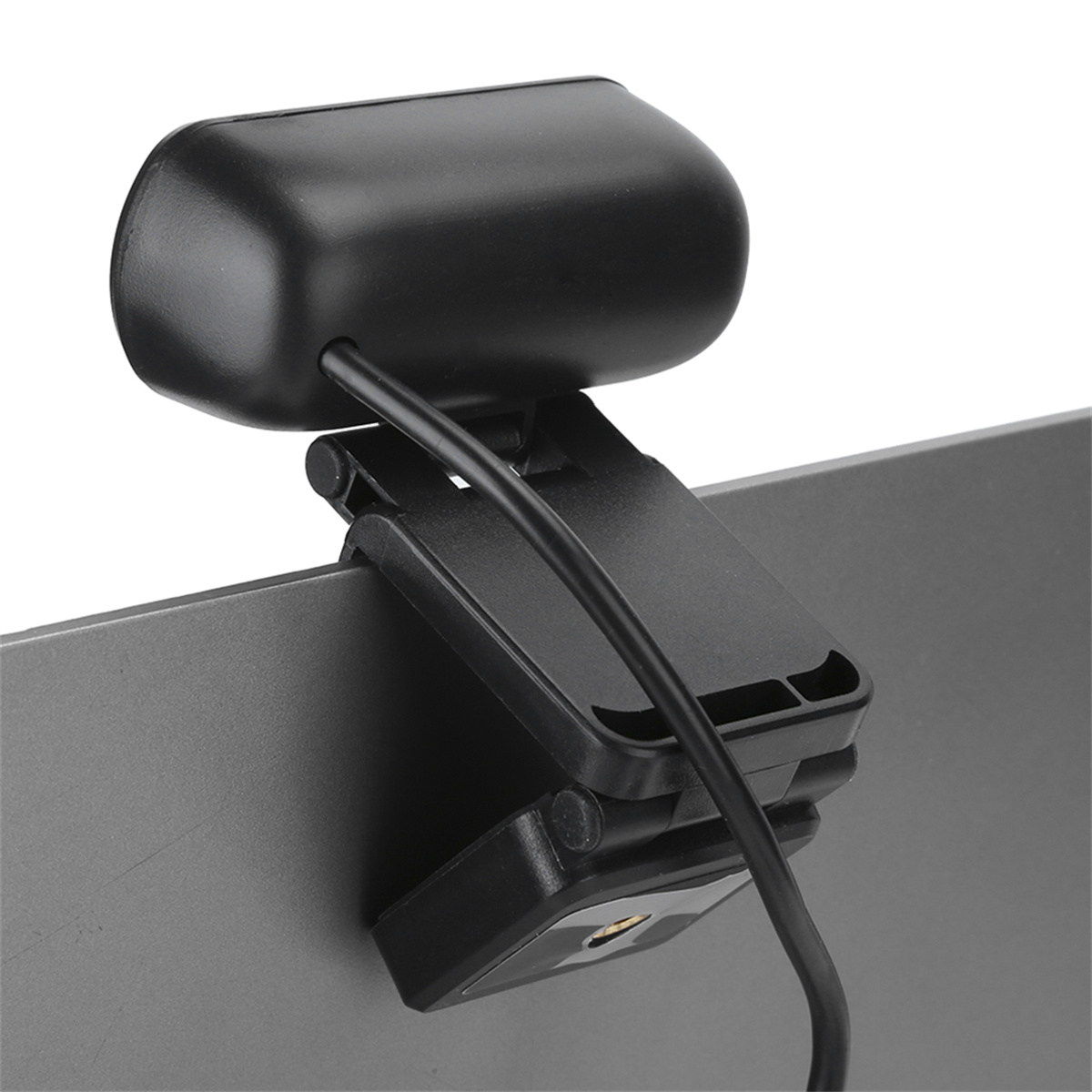 Schwarze Webcam am Laptopbildschirm befestigt. Die Webcam ist oben.
