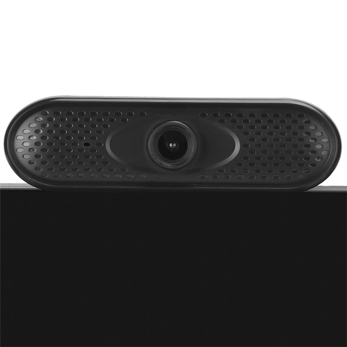 Eine schwarze Webcam. Die Vorderseite hat viele kleine Löcher. Die Webcam befindet sich auf einer schwarzen Oberfläche.