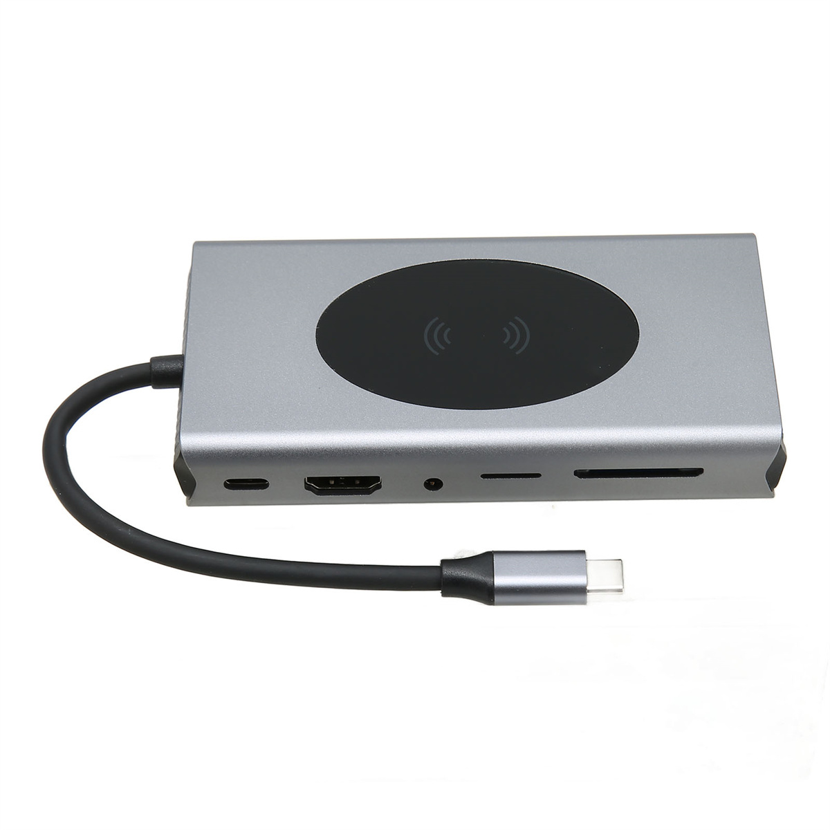 Silberner Multi-Port-Adapter mit schwarzem Kabel, USB-C-Anschluss und kabelloser Ladefläche.