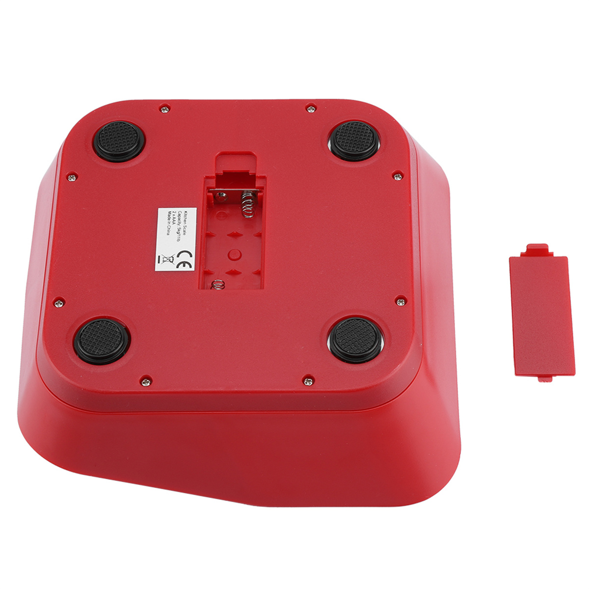 Die Unterseite einer roten quadratischen Waage mit schwarzen Füßen und einem Batteriefach mit roter Abdeckung.