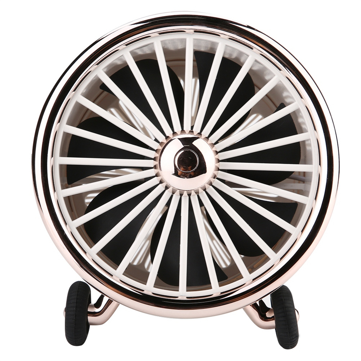 Ein kleiner, roségoldener Ventilator mit weißem, kreisförmigem Gitter, montiert auf zwei schwarzen Rädern.