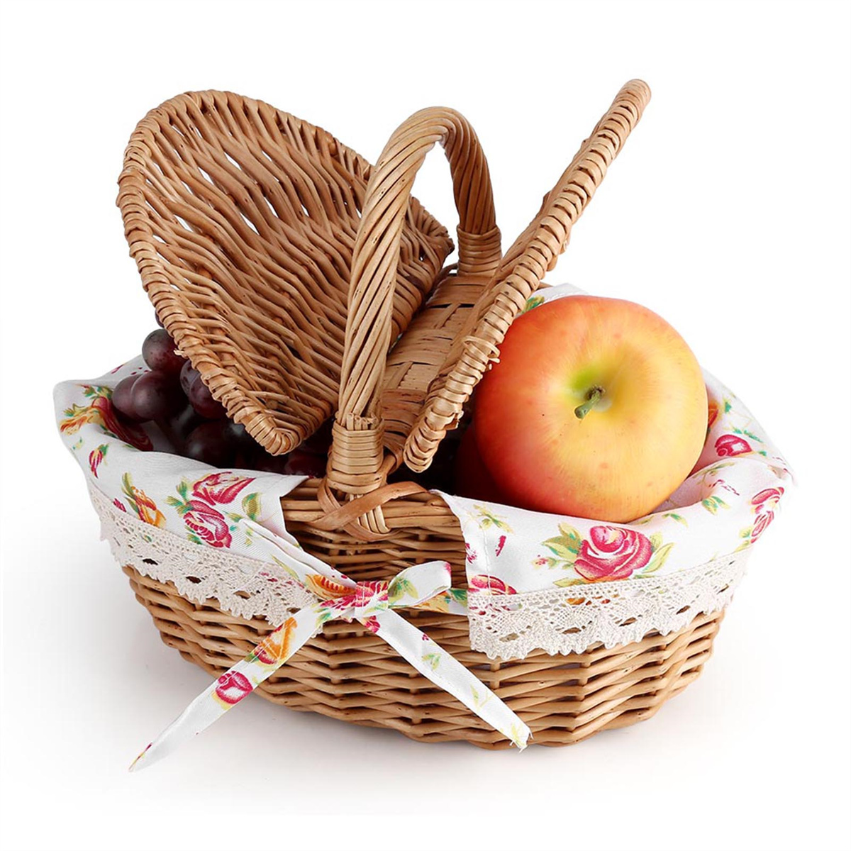 Weiden-Picknickkorb mit Obst: Trauben und Apfel. Blumenstoff innen.