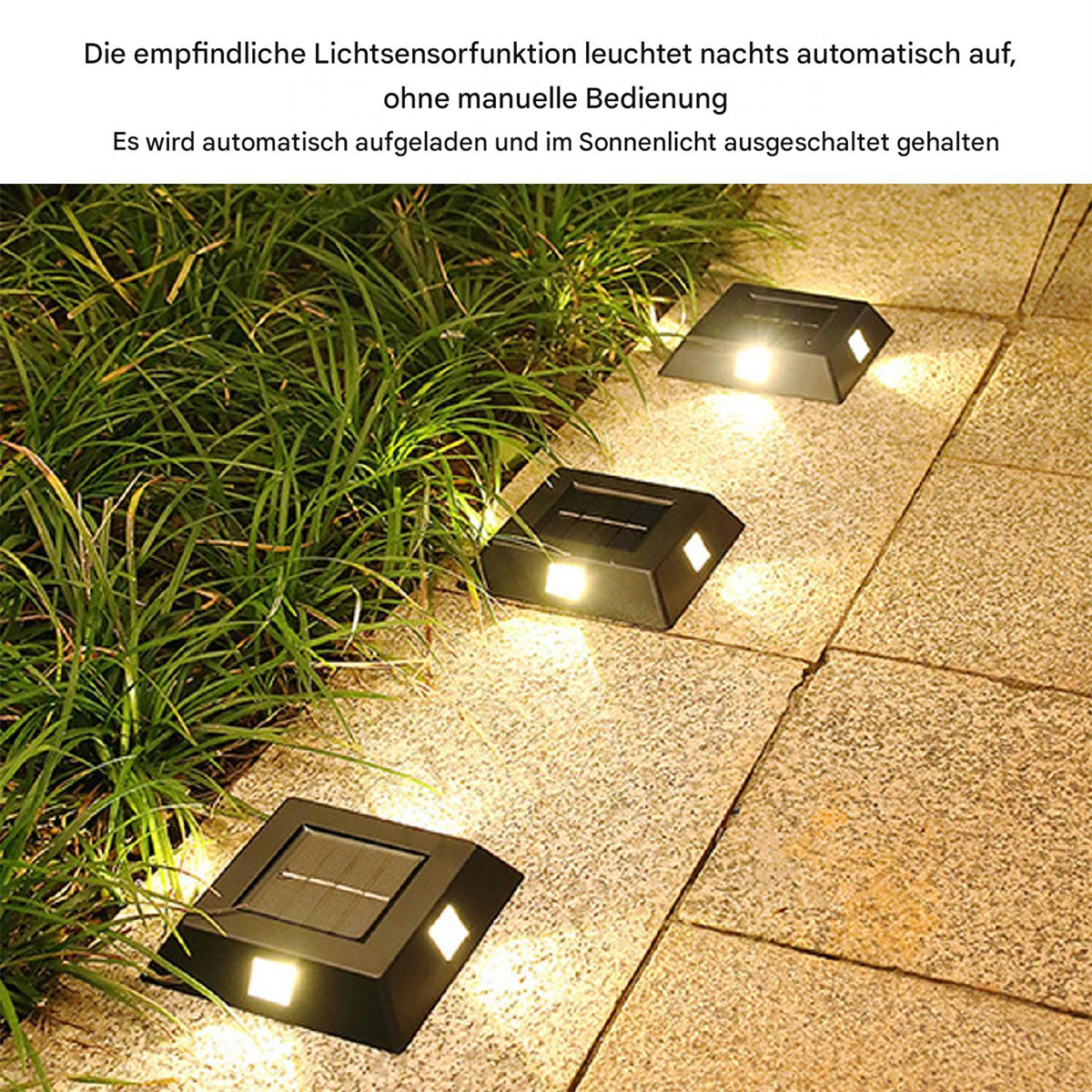 Drei schwarze Solarleuchten auf einem Steinweg, die Licht aussenden. Die Lichter schalten sich nachts automatisch ein.