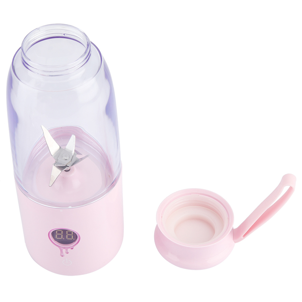 Eine rosa Mixflasche mit Klingen im Inneren und einem offenen Deckel daneben.