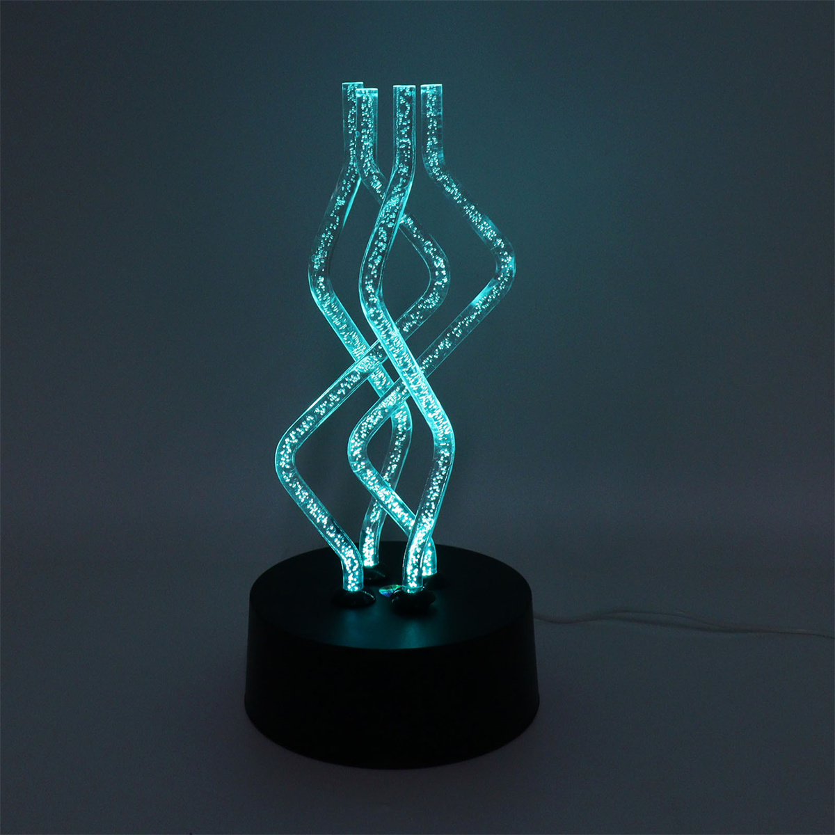 Dekorative blaue Leuchte mit schwarzem Sockel, leuchtend mit einzigartigem Design.