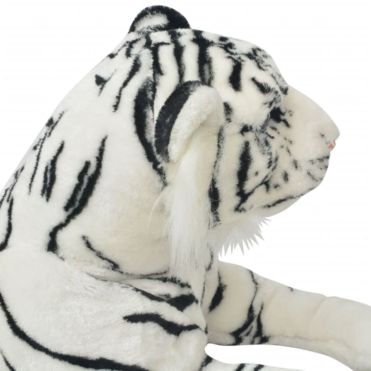 Ein weißer Plüschtiger mit schwarzen Streifen liegt frontal.