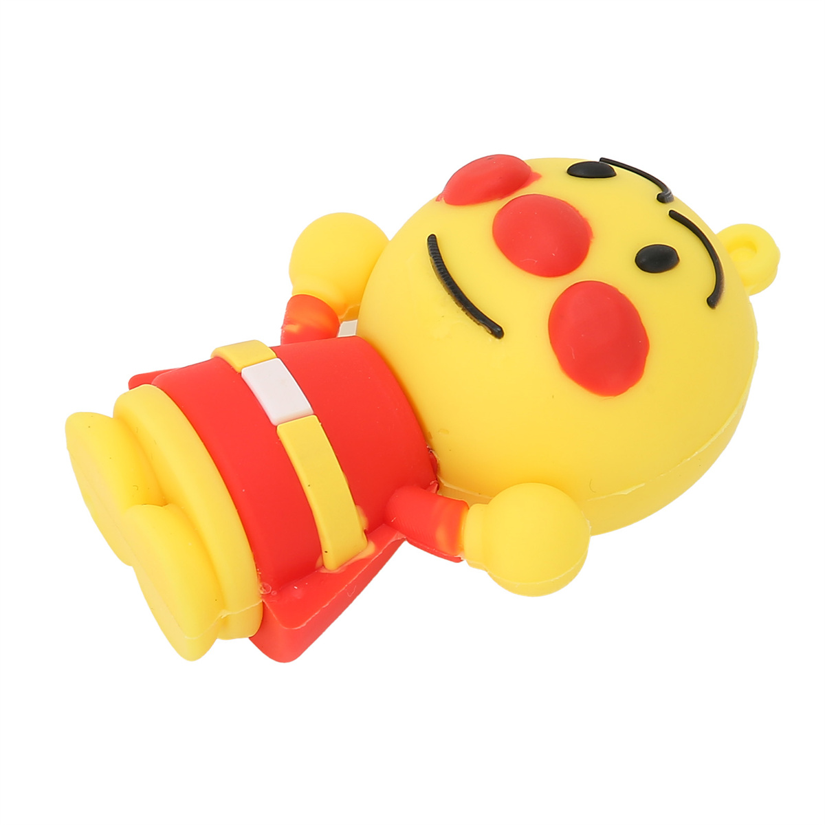 Ein gelber USB-Stick in Form einer Zeichentrickfigur mit roter Kleidung und schwarzen Haaren.