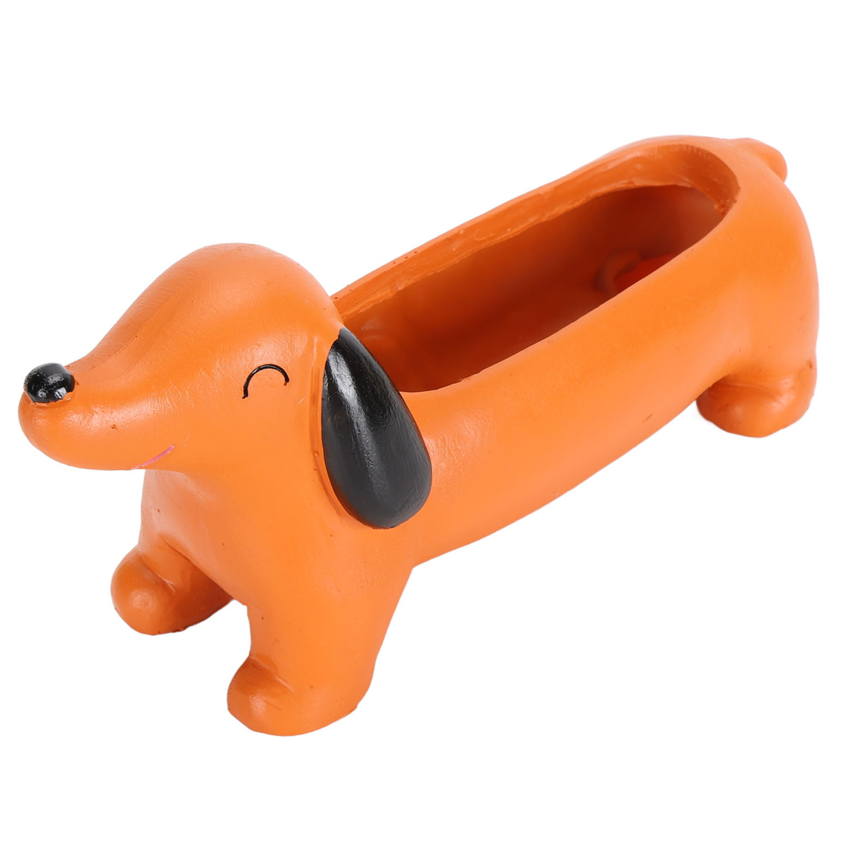 Orangener Dackel-förmiger Pflanztopf mit schwarzen Ohren und einem lächelnden Gesicht, auf weißem Grund.