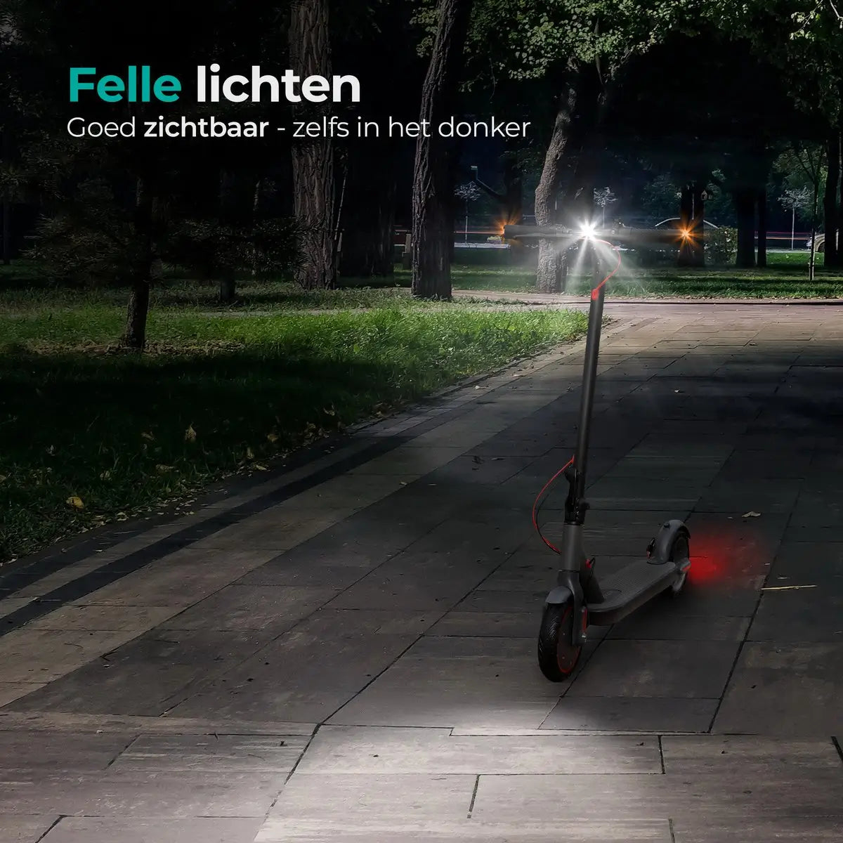 E-scooter on a path at night with bright headlight and red tail lights.  Green grass and trees in background.