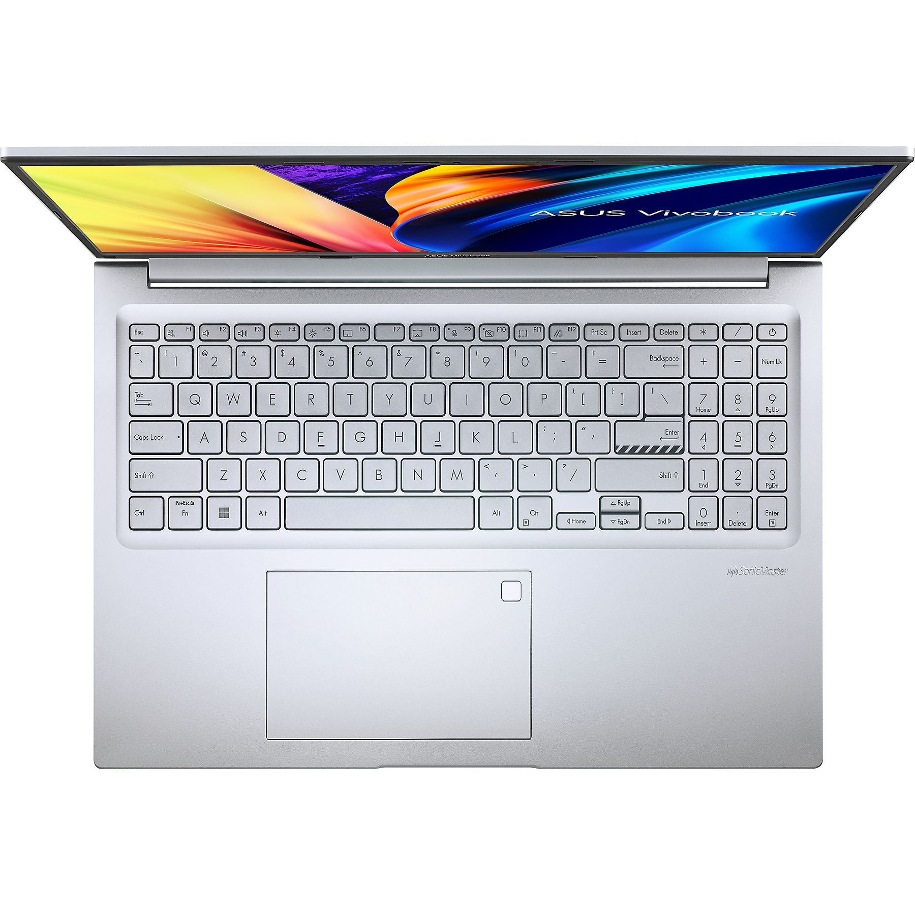 Un laptop argentato, aperto, con la tastiera visibile.