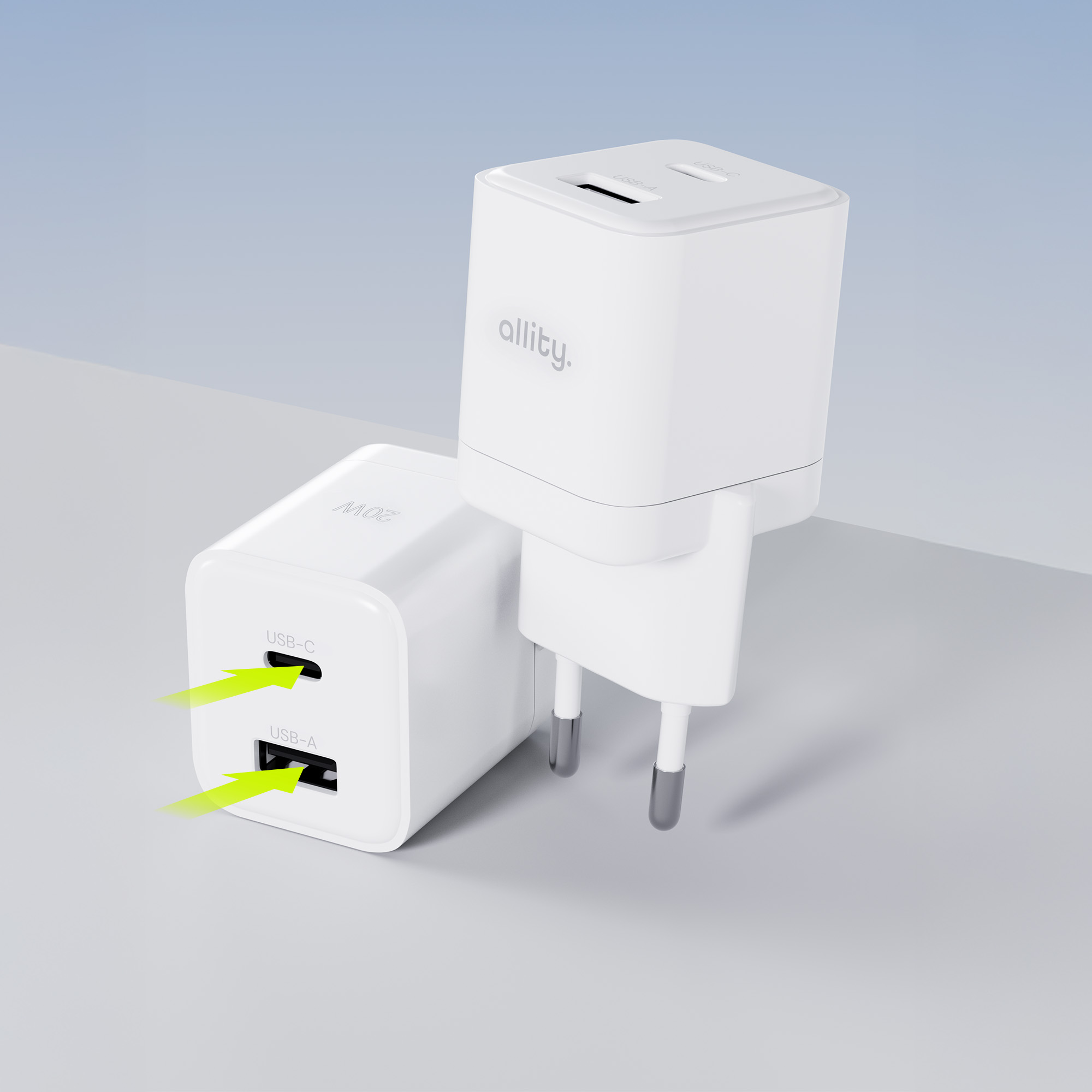 Dwie białe ładowarki ścienne z portami USB-C i USB-A. Jedna włożona do ściany.